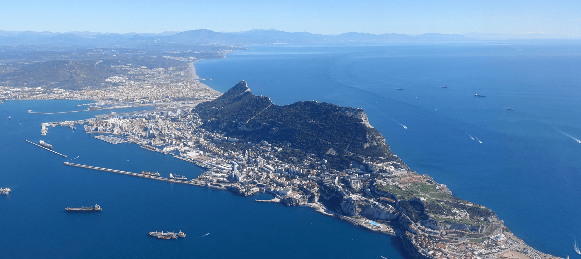 Aerial view of Gibraltar showing the port and shipping routes to the United Kingdom