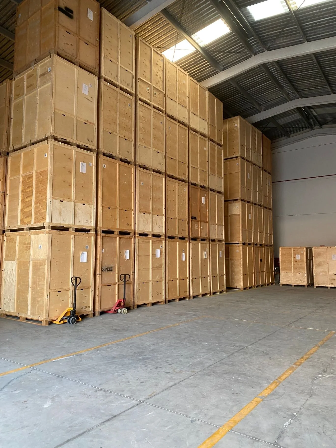 Secure wooden storage crates arranged inside Bishop’s Move's warehouse in Algeciras, Spain