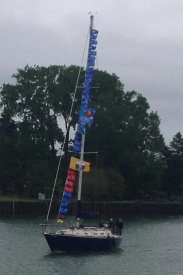 Blue Heaven with a hoist of blue flags