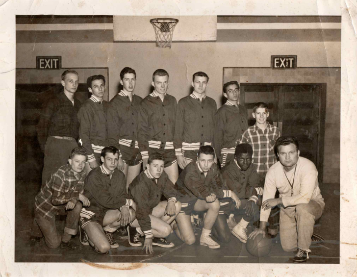  Here Jim can be seen standing on the right behind his coach. Jim’s older brother Bob can be seen second from the left on the bottom row. 