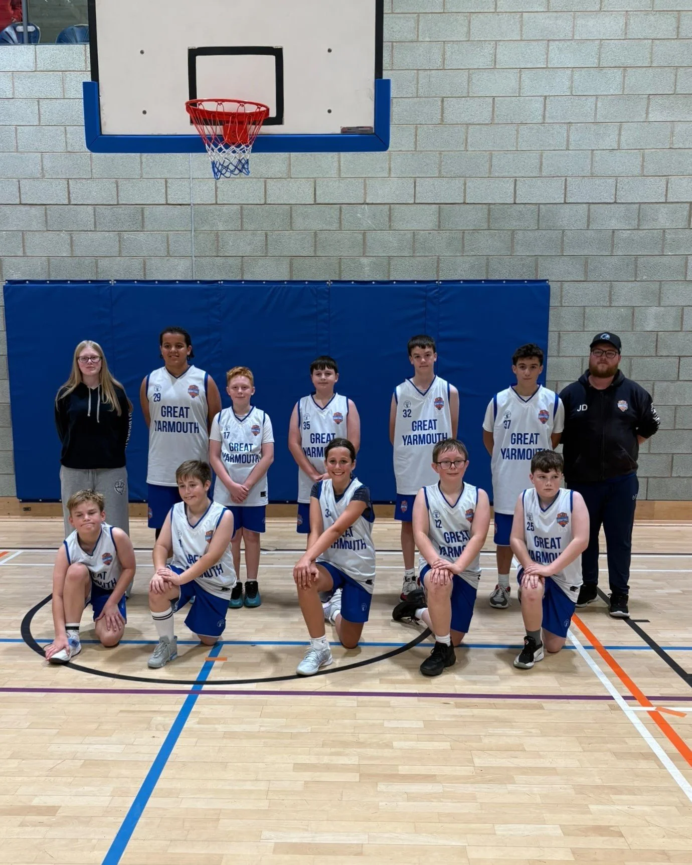 Great Yarmouth Basketball Club U13 Mixed Development players posing for a team photograph at Sportspark UEA.