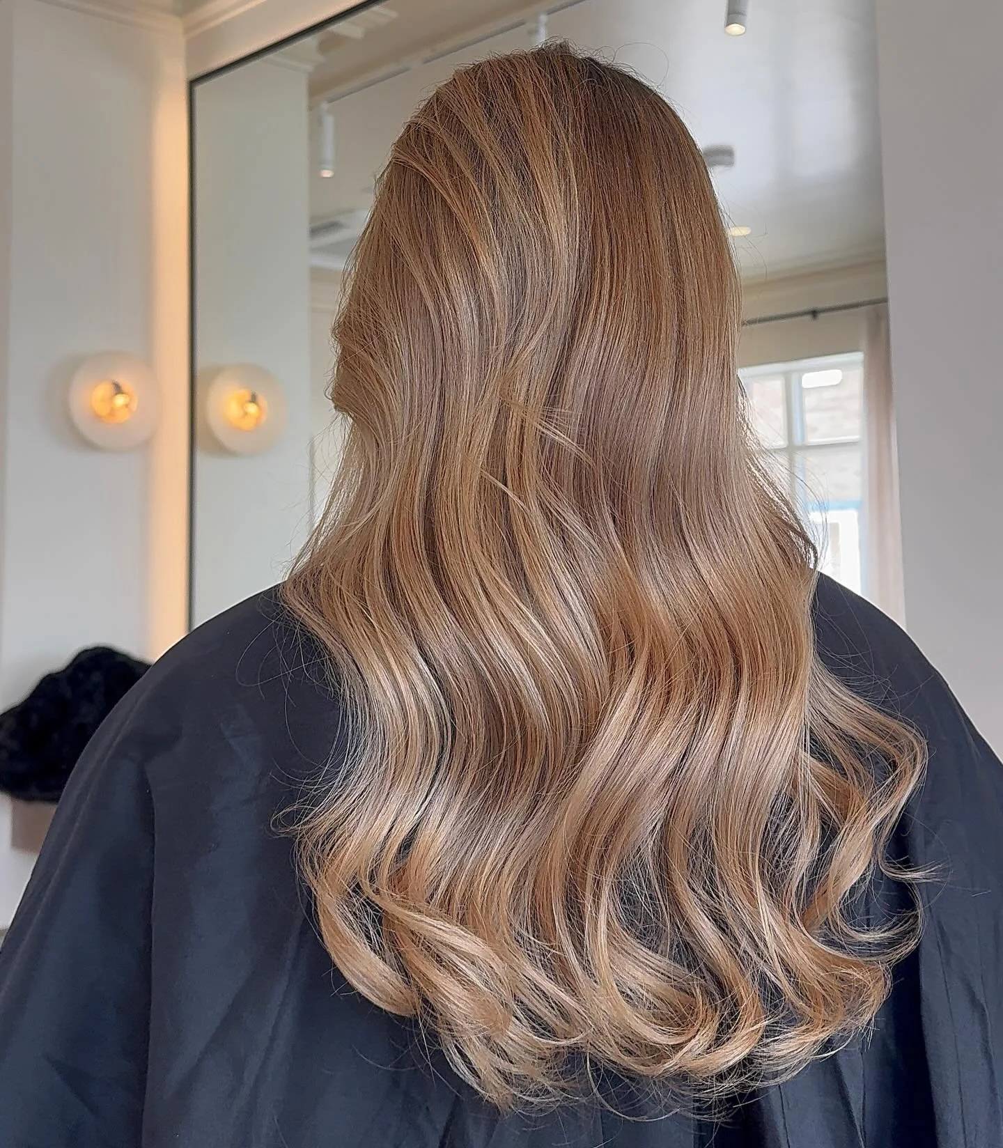 Golden blonde, kept close to her natural base.

When blonde sits in harmony with your natural colour, it reflects light more softly and grows out beautifully. The result is something that feels effortless rather than overworked.

Blonde doesn&rsquo;t