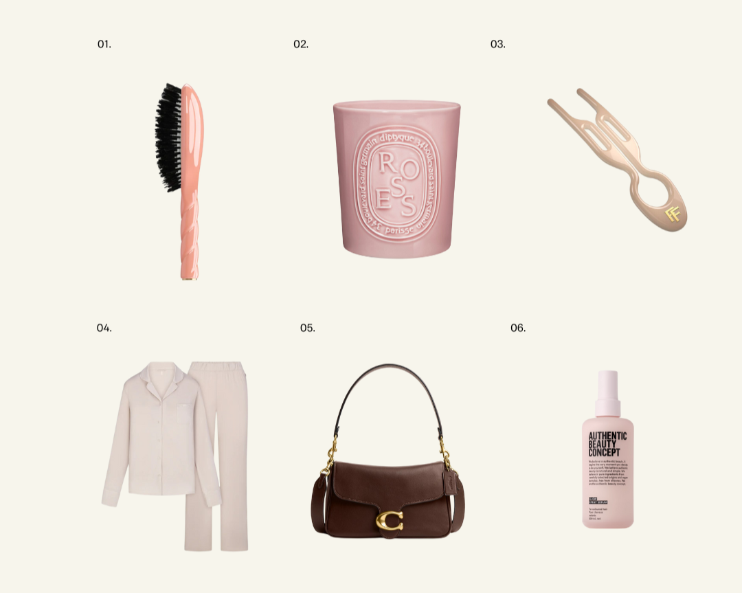 Flat-lay image featuring Lucy’s six curated gifts: a La Bonne Brosse pink hairbrush, Diptyque Roses candle, Fiona Franchimon hairpin, soft cream Skims pyjamas, a brown Coach shoulder bag, and ABC Glow Spray.