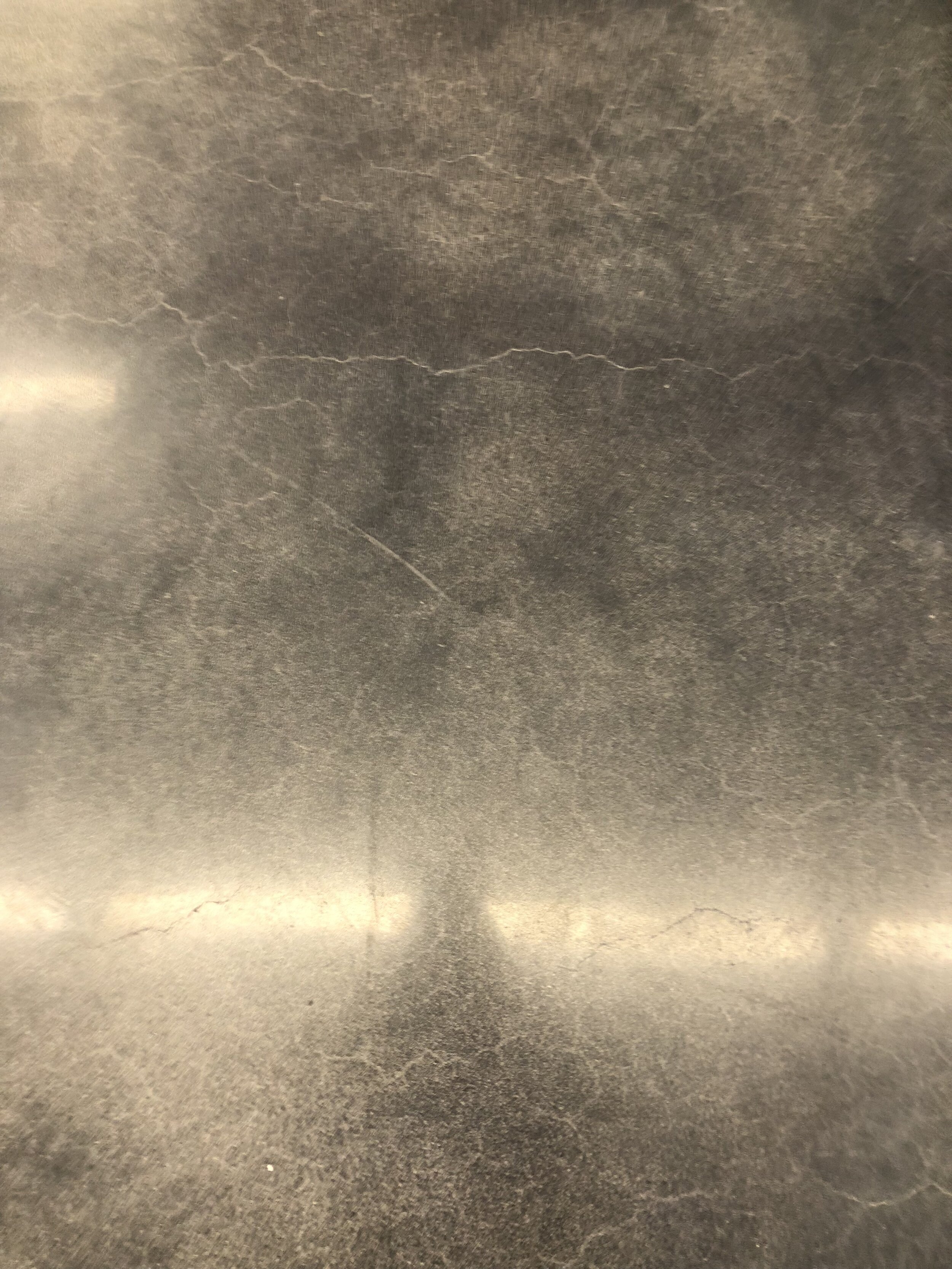 grey cracked flooring.jpg