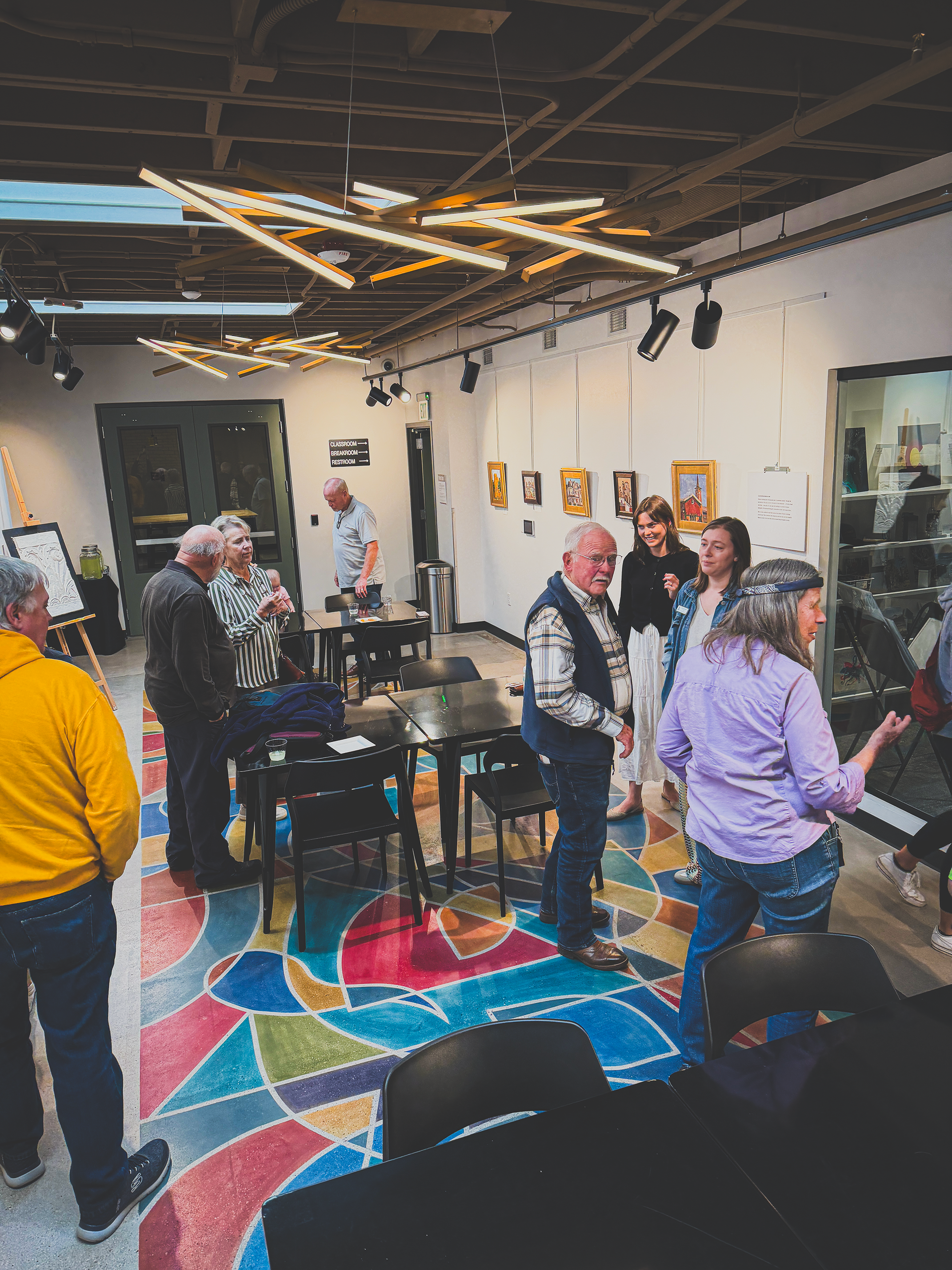  People view the Historic Preservation exhibition in the Greeley Creative Arts Center’s Wardell Gallery during the opening reception in May. 