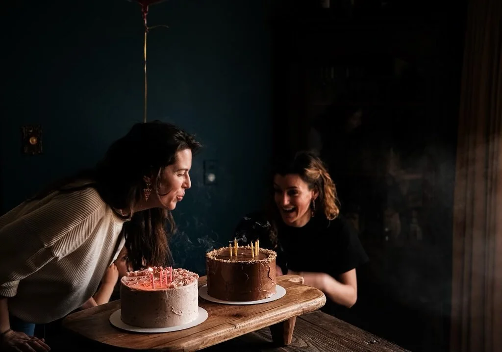 Double birthdays = double cake = double the fun. 1)Chocolate cake with peanut butter buttercream center and a velvety chocolate outside. 2) lemon cake with strawberry compote, lemon buttercream inside and strawberry buttercream outside. Happy birthda