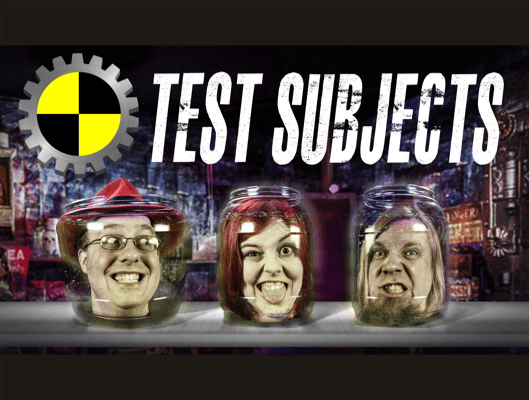 three human heads in jars smiling, the test subjects