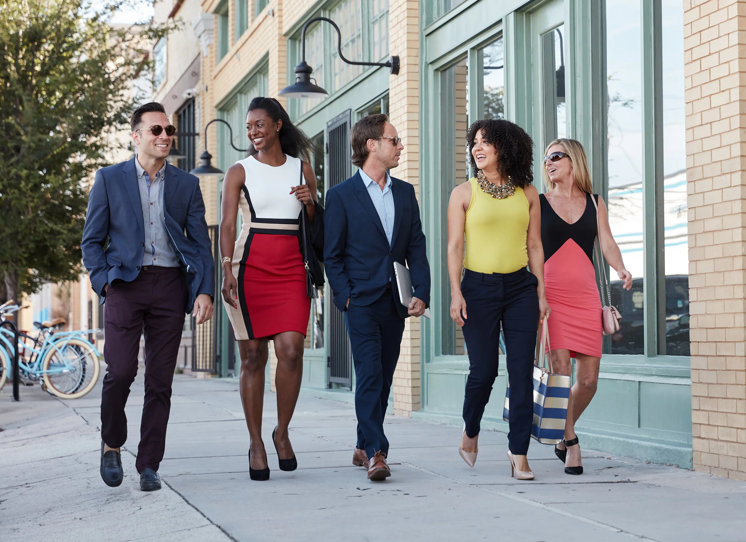 executives walking through camera.jpg