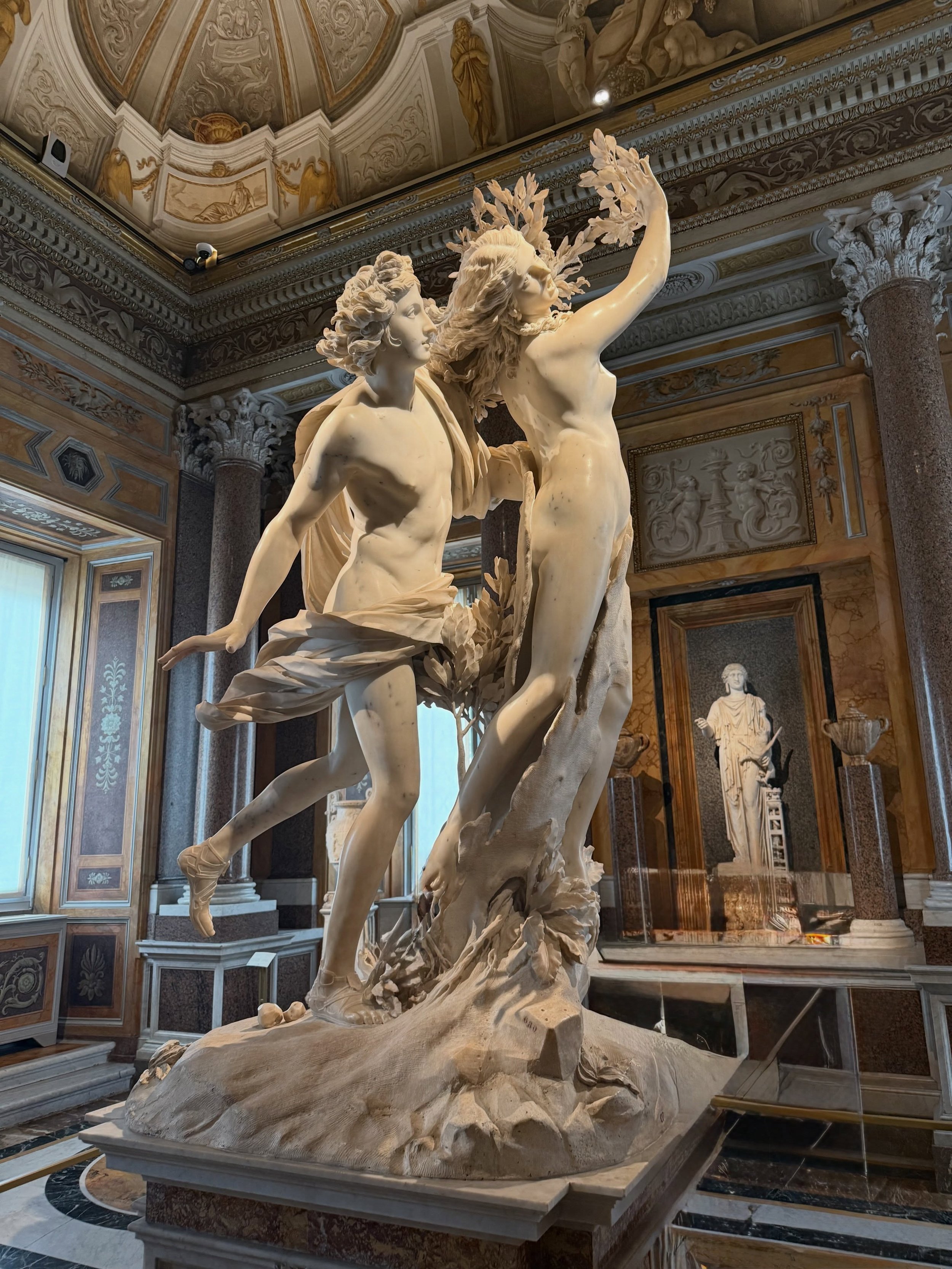 A 24 year old man took a single block of marble and carved hair that blows in the wind, grasping fingers and bark that you can almost feel splintering under your hand. 
 
Bernini carved Apollo and Daphne between 1622 and 1625, and is one of the most 