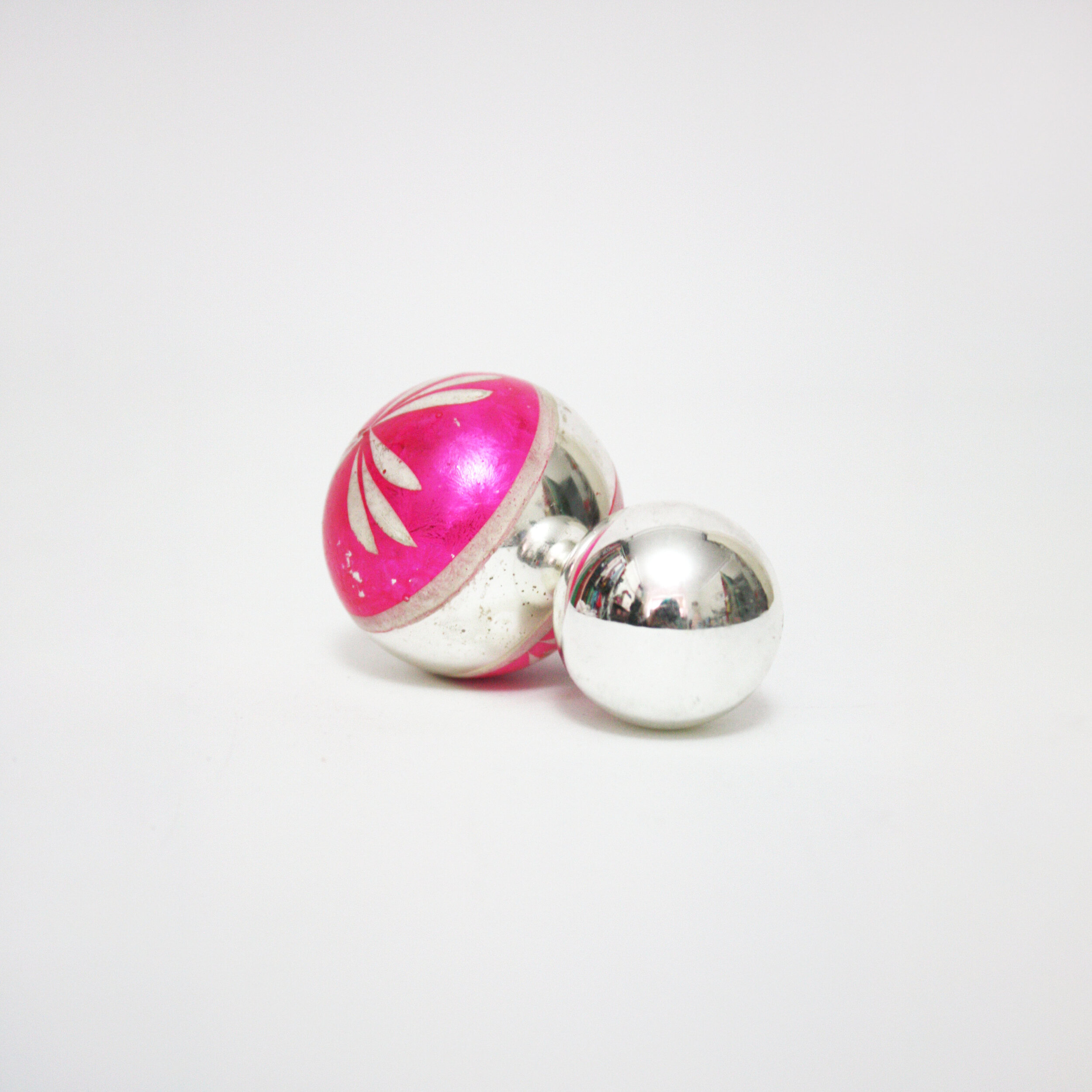 Mirrored silver and pink vintage Christmas baubles 