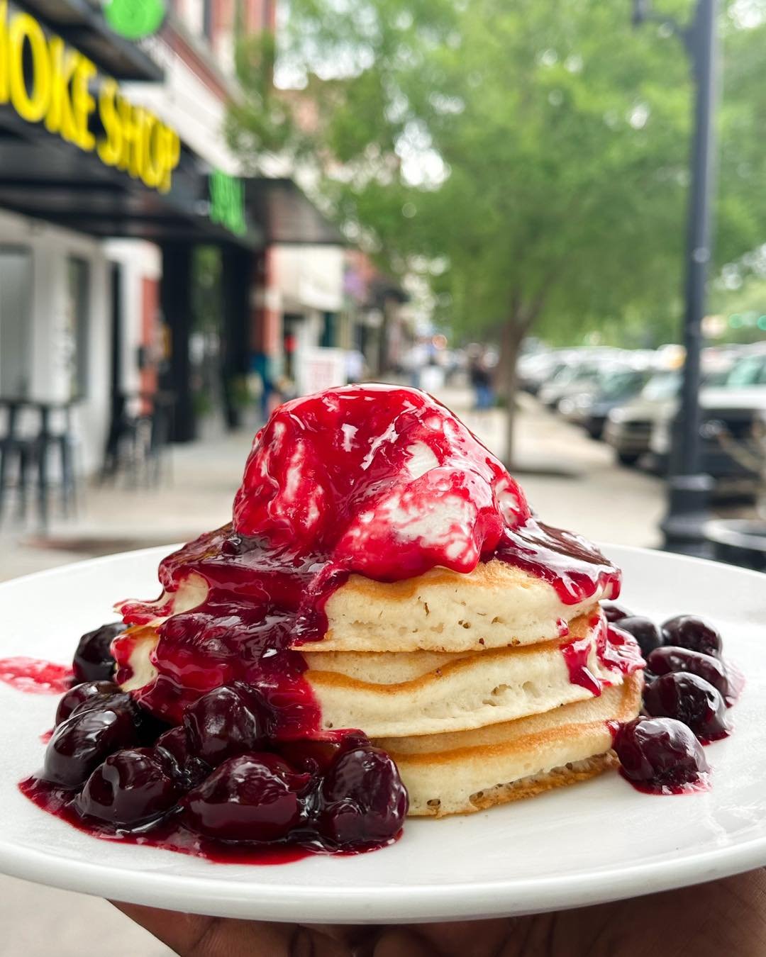 Brunch just got sweeter with our special Cherry Jubilee Pancakes! 🍒✨ Indulge in fluffy pancakes topped with a burst of cherry goodness. It's the perfect way to start your day. Join us for brunch until 3 p.m. and treat yourself to this delightful cre