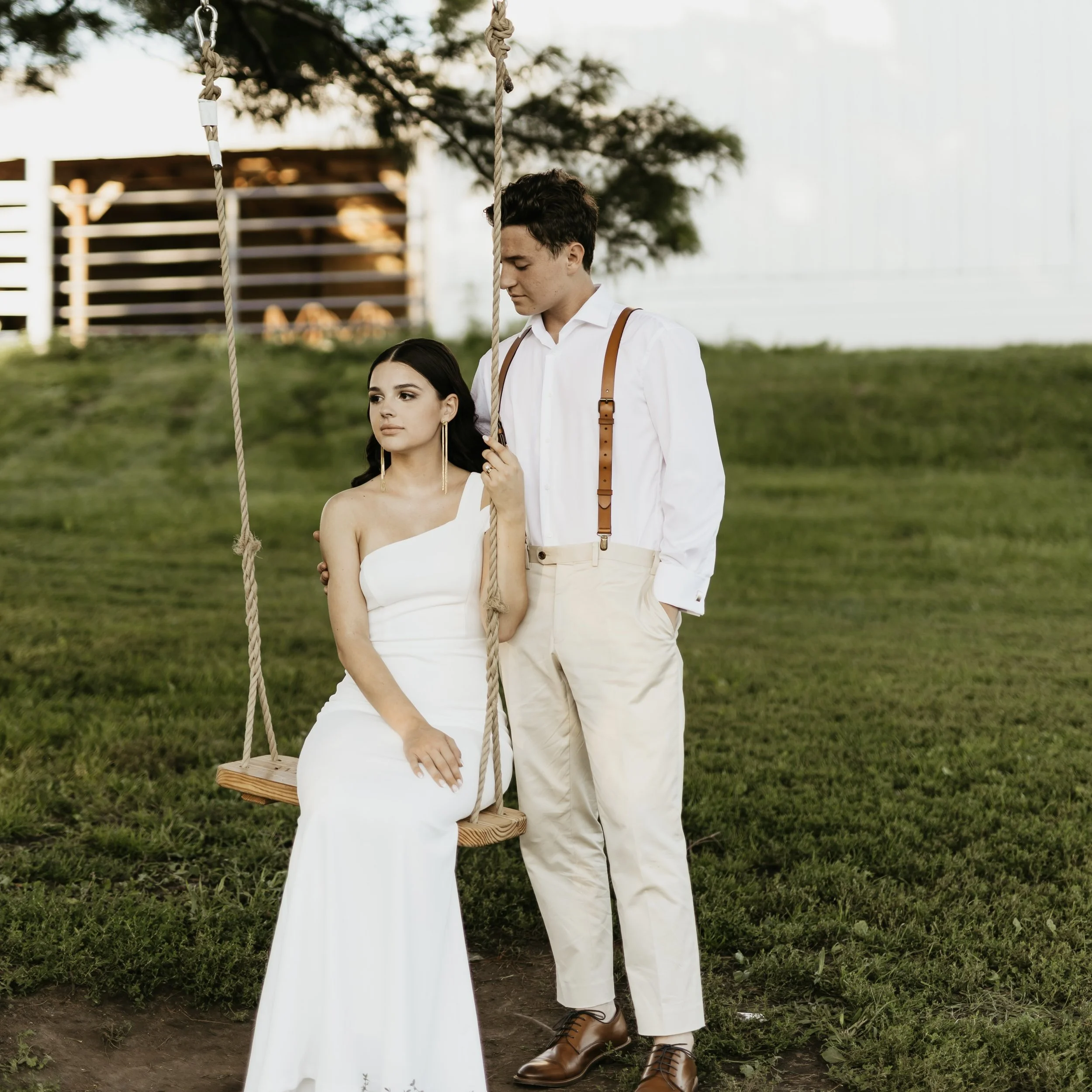 Couple Standing Together By a Swing