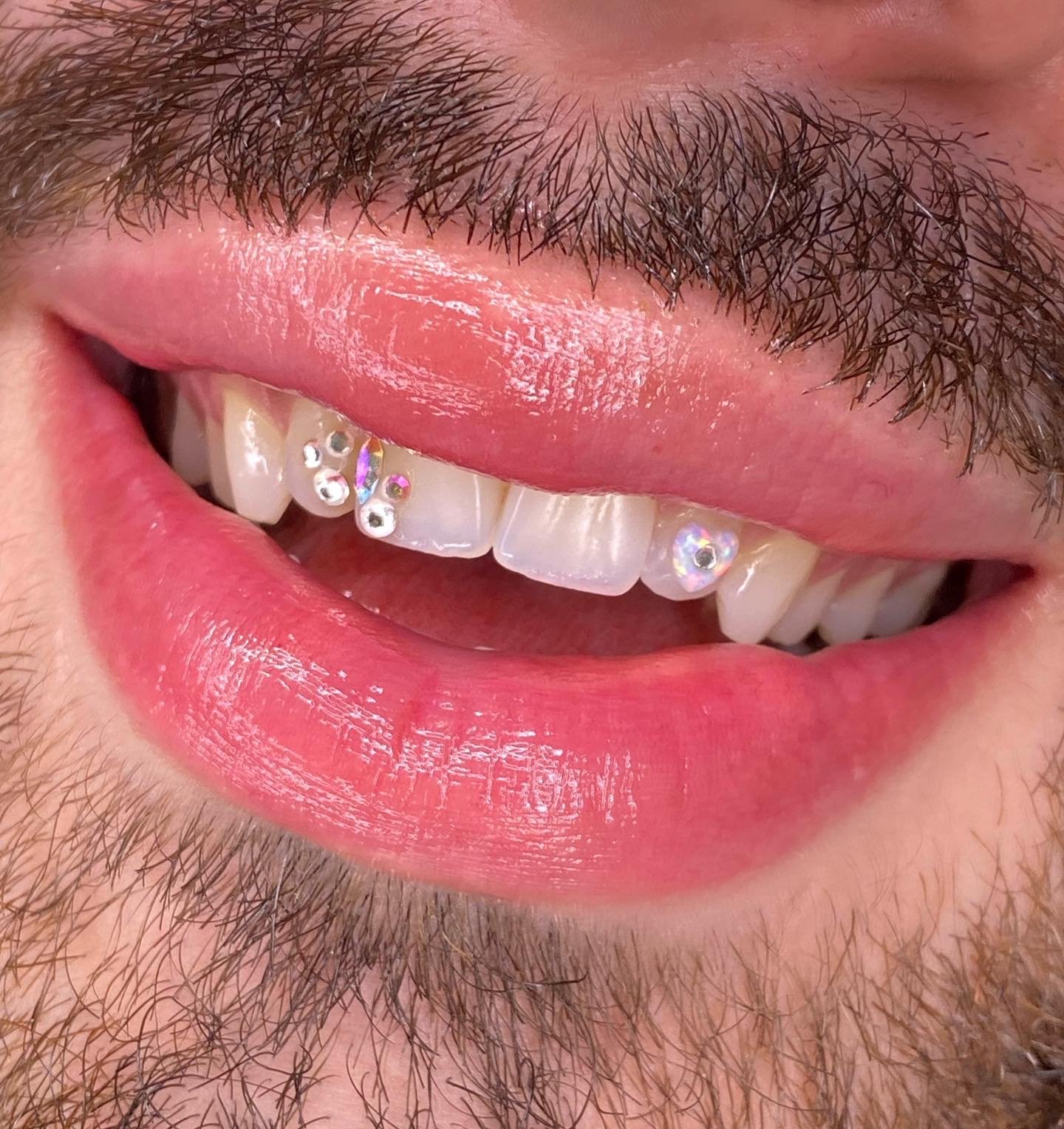 live by the sword tattoo tooth gems