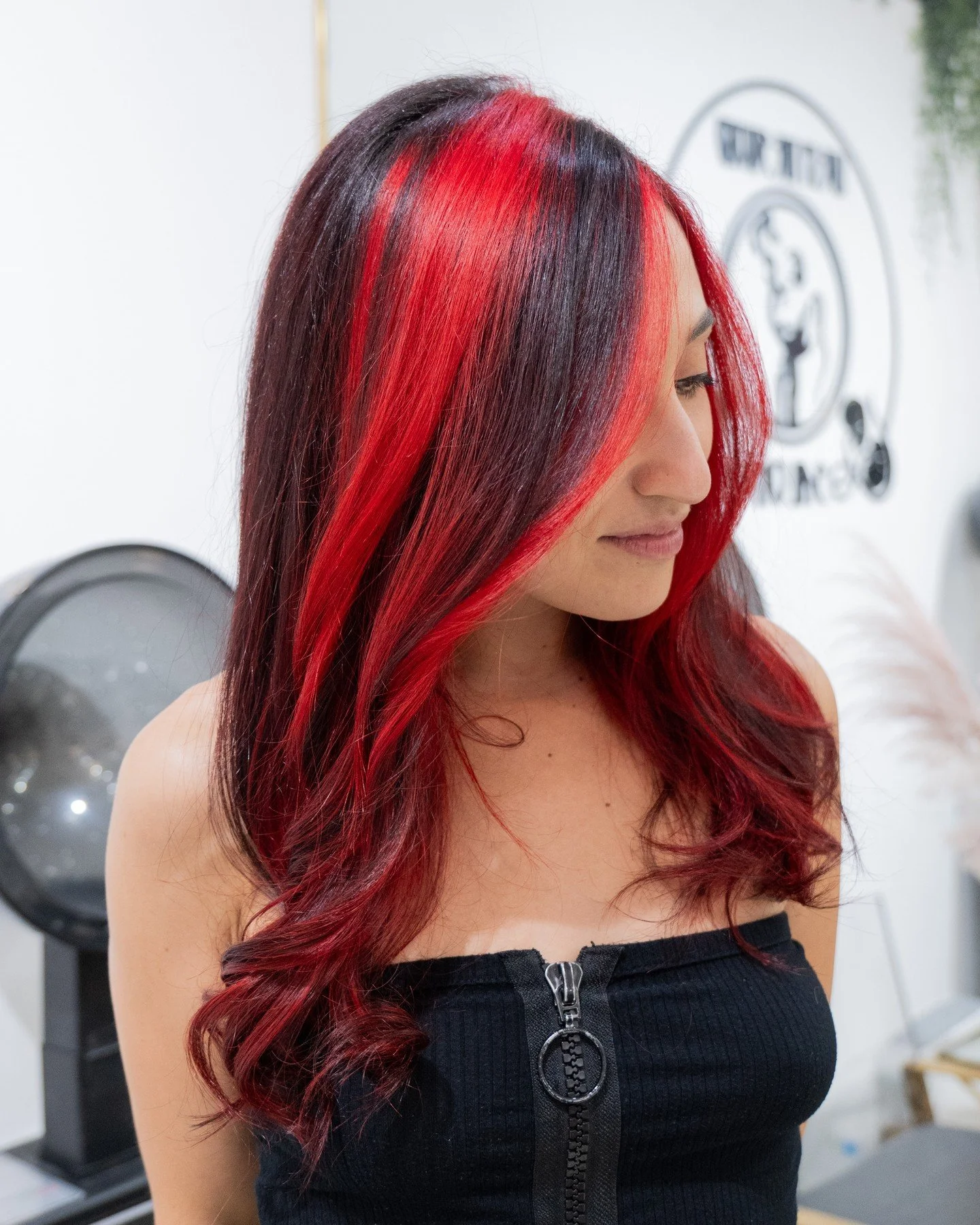 Celebrate the new year with the hairstyle you&rsquo;ve been dreaming of ❤️🖤

Red color block highlights with Kristina @kristina.d.beauty 

📍Located in the heart of Williamsburg, Brooklyn
📱Book your fantasy hair appointment today at www.livebythesw