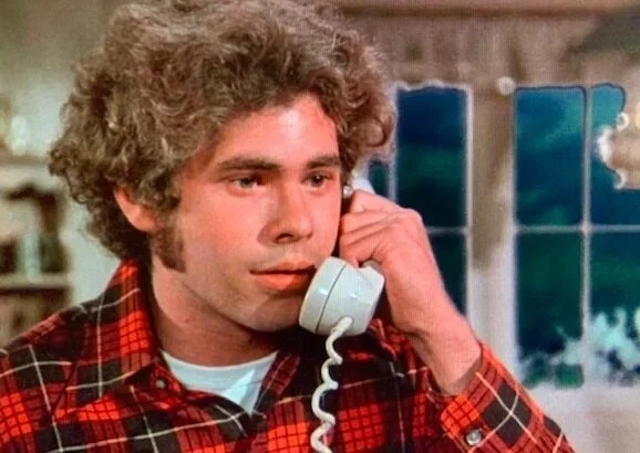 Disney's Gus (1976)_Gary Grimes as Andy Petrovic talking on the phone to Debbie