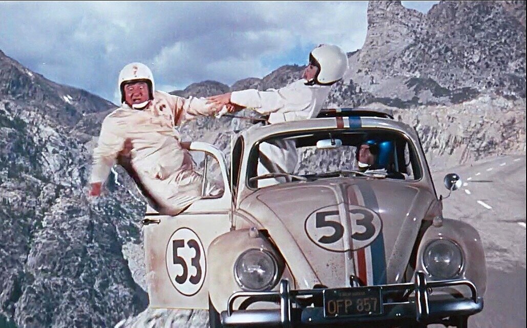 Disney's The Love Bug (1968)_Buddy Hackett as Tennessee nearly falls out of Herbie