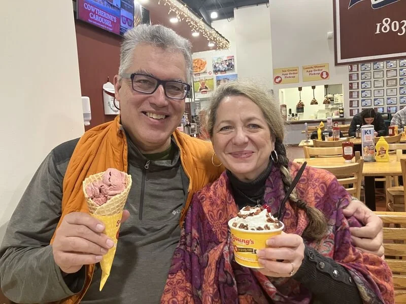 A husband and wife eating ice cream
