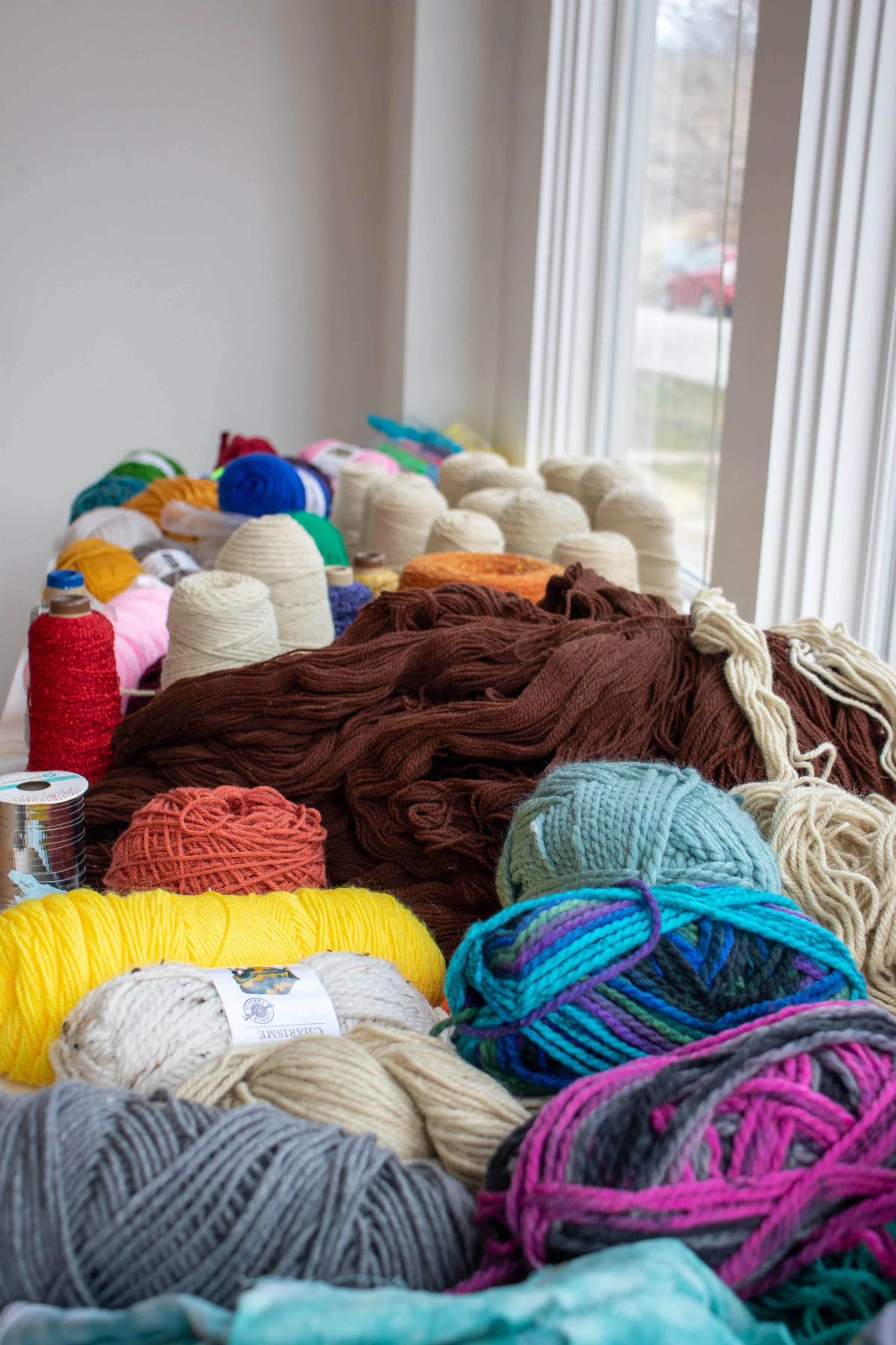 Image of a pile of various colored yarn