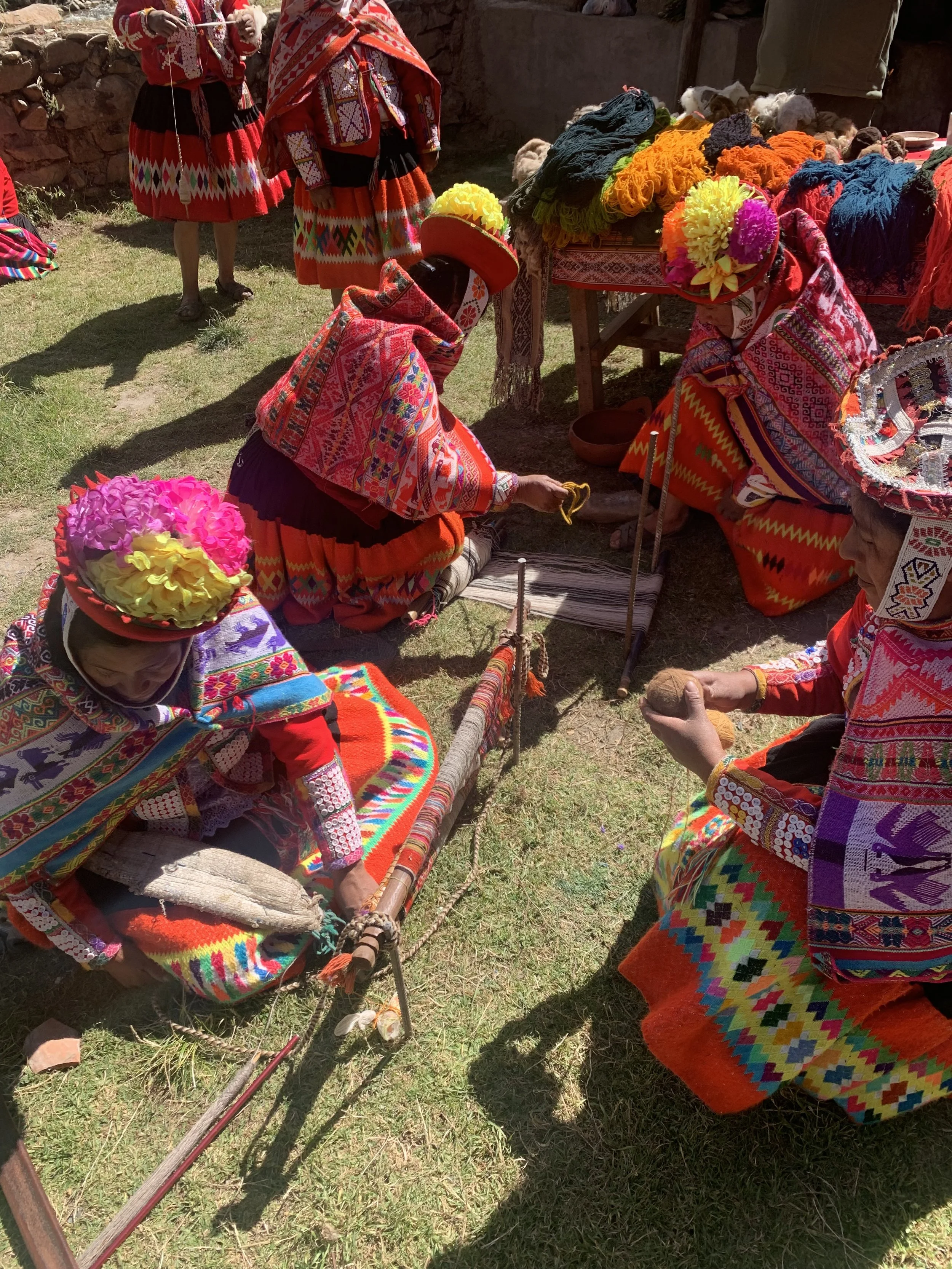 Quechua artisans backstrap loom weaving demonstration