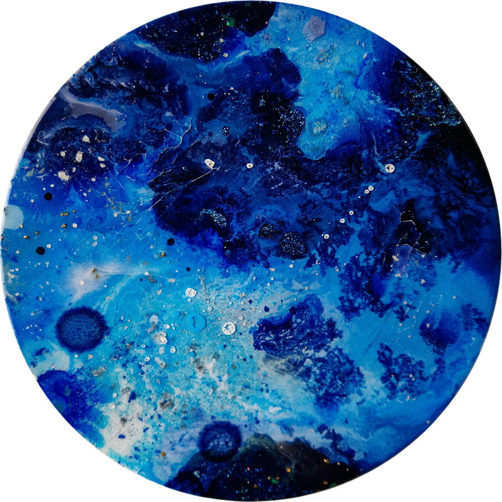 Circular blue resin abstract art with shades of blue, white, and black, ocean resin art, ocean epoxy art, ocean art, coastal decor, coastal art. Original bespoke abstract artwork created by artist Katie Alize, based in UK, Essex, London.