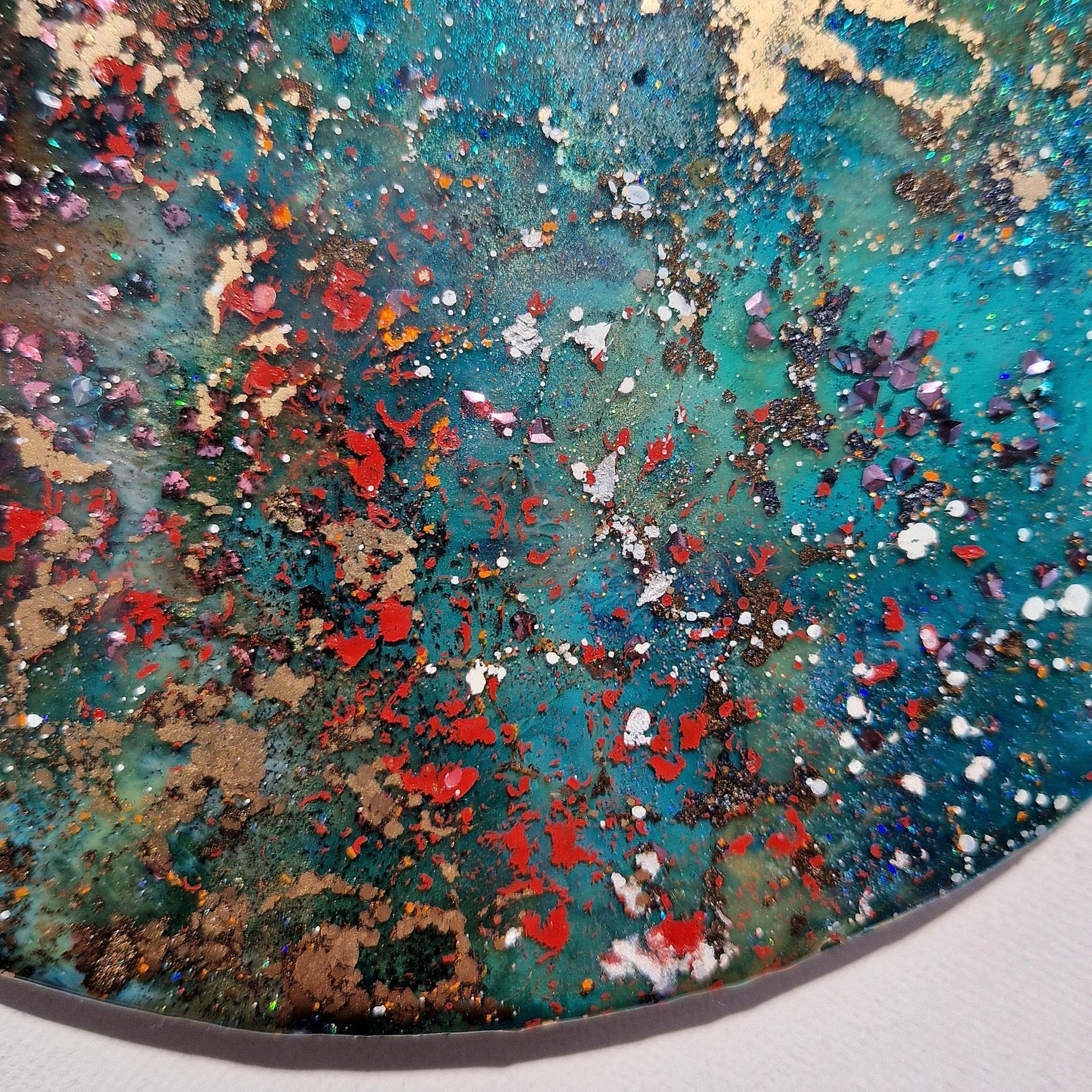 Nature-inspired resin mixed media circle wall art with organic textures & vibrant hues.