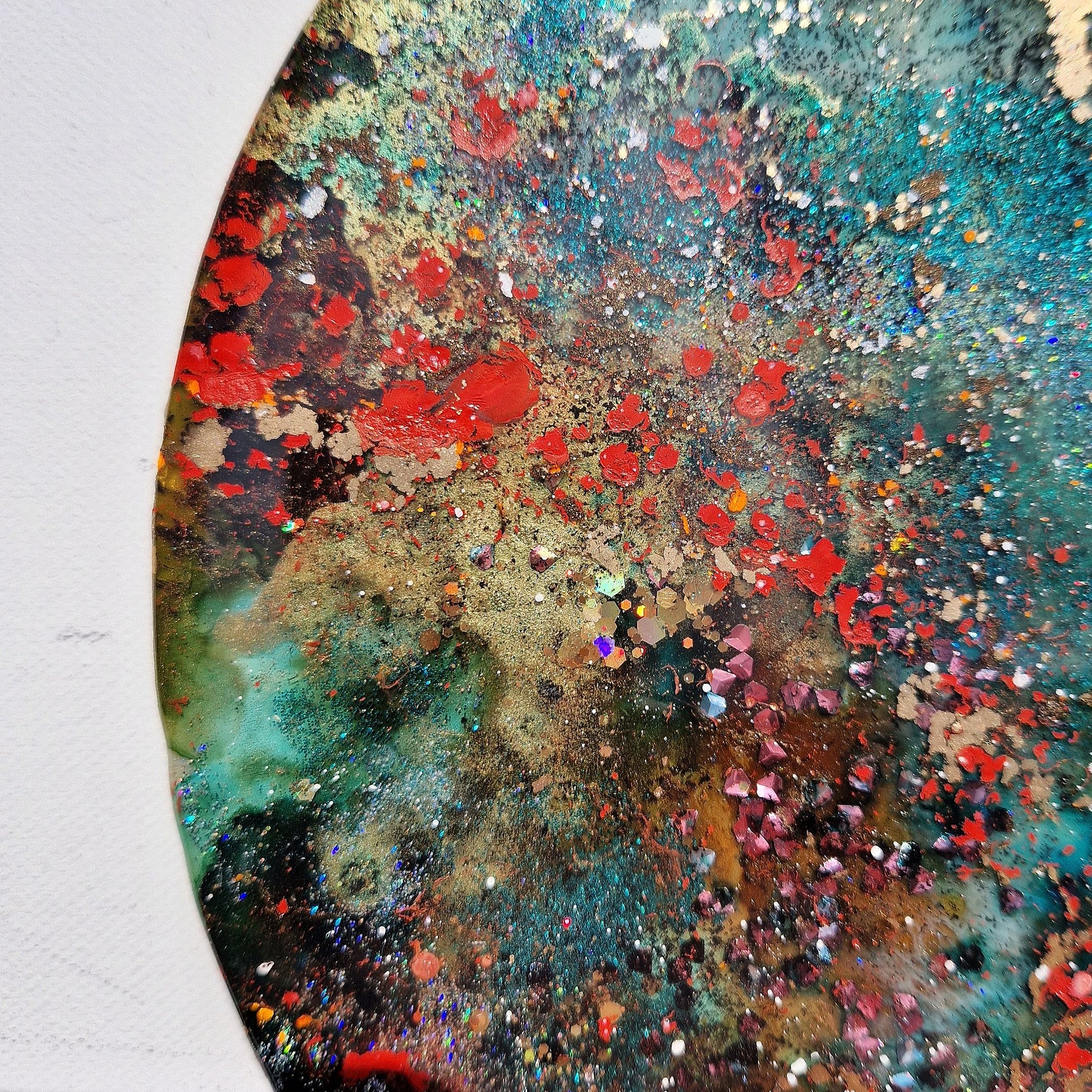 Nature-inspired resin mixed media circle wall art with organic textures & vibrant hues. UK resin artist Katie Alize