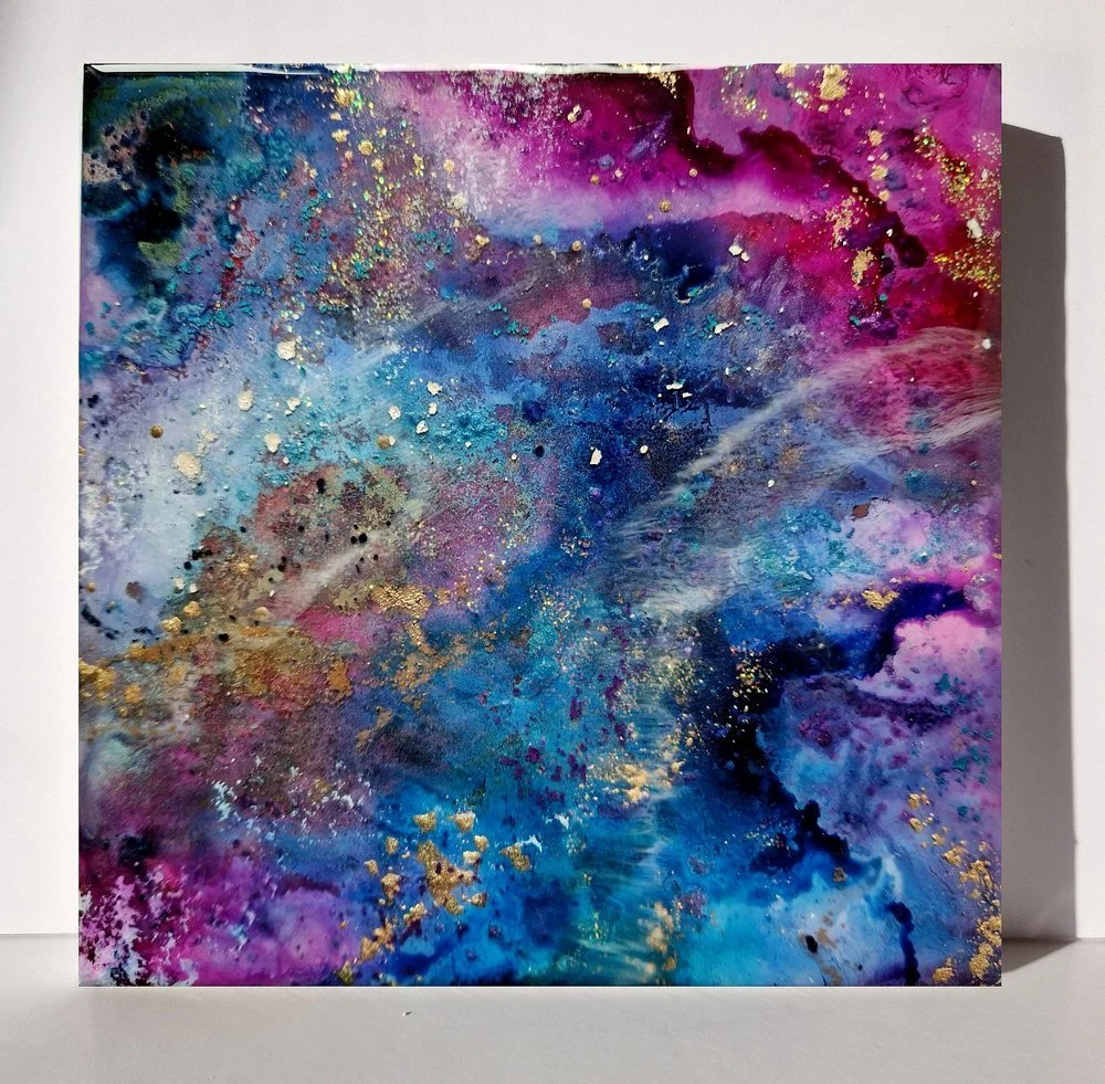 Blue resin abstract art with shades of blue, white, and black, ocean resin art, ocean epoxy art, ocean art, coastal decor, coastal art. Original bespoke abstract artwork created by artist Katie Alize, based in UK, Essex, London.