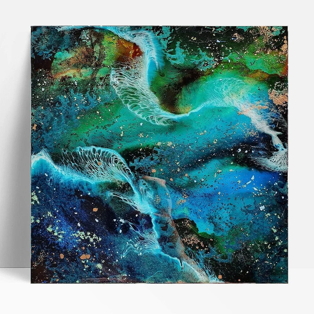 Circular blue resin abstract art with shades of blue, white, and black, ocean resin art, ocean epoxy art, ocean art, coastal decor, coastal art. Original bespoke abstract artwork created by artist Katie Alize, based in UK, Essex, London.