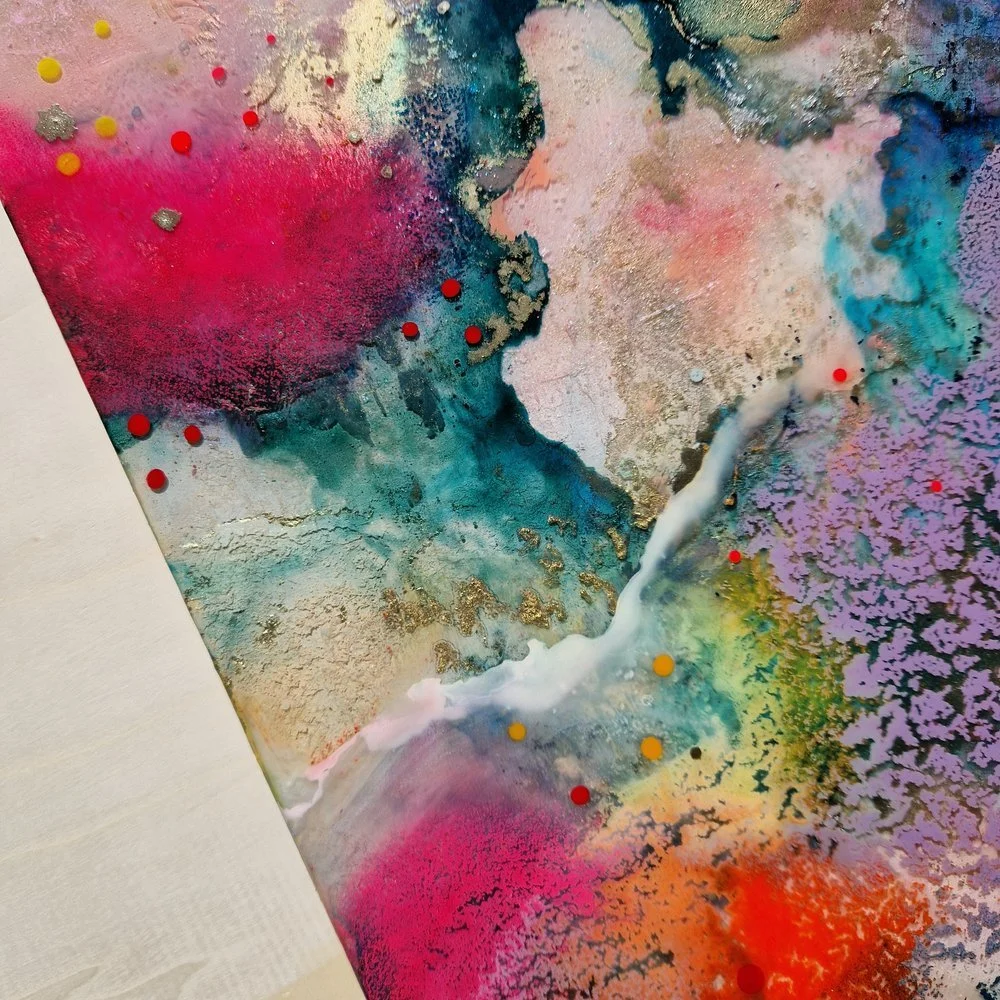 Modern interior with a colourful abstract painting on a white wall. Original bespoke abstract artwork created by artist Katie Alize, based in UK, Essex, London. Colourful abstract art.