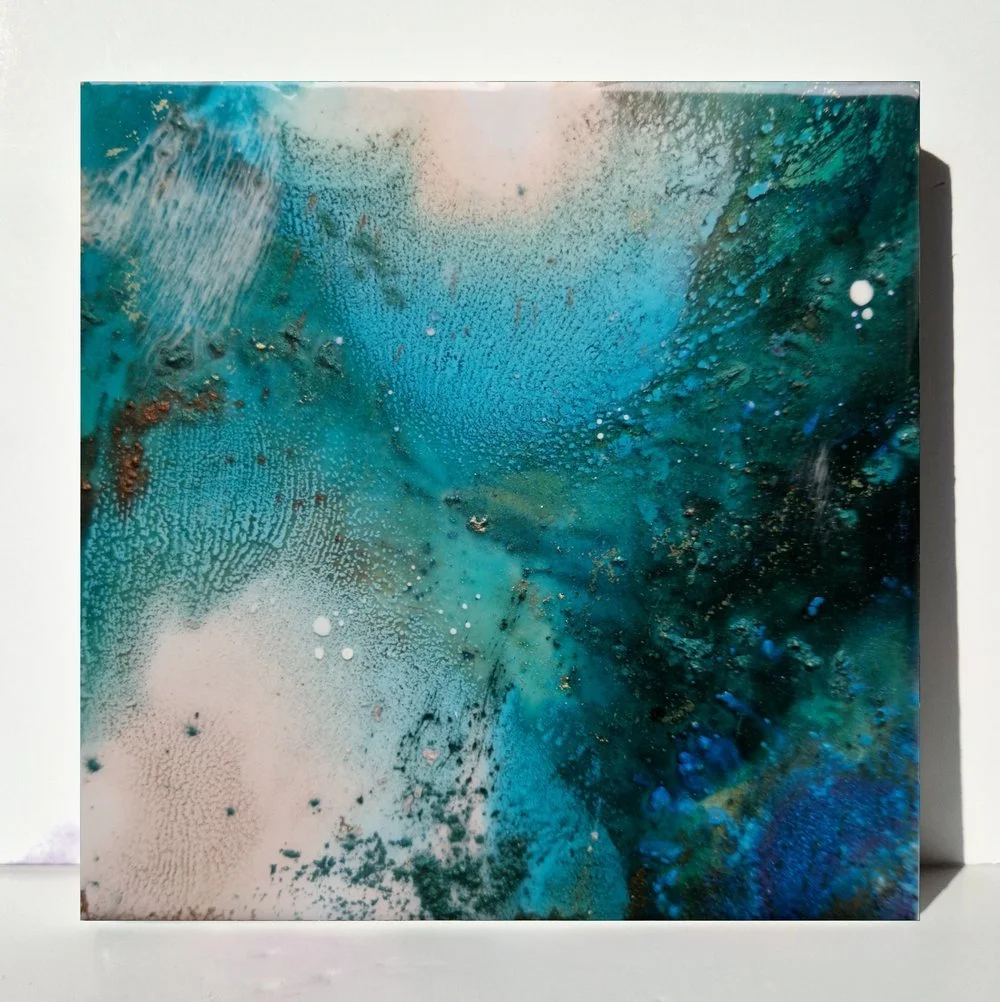 Blue resin abstract art with shades of blue, white, and black, ocean resin art, ocean epoxy art, ocean art, coastal decor, coastal art. Original bespoke abstract artwork created by artist Katie Alize, based in UK, Essex, London. Epoxy resin beach art