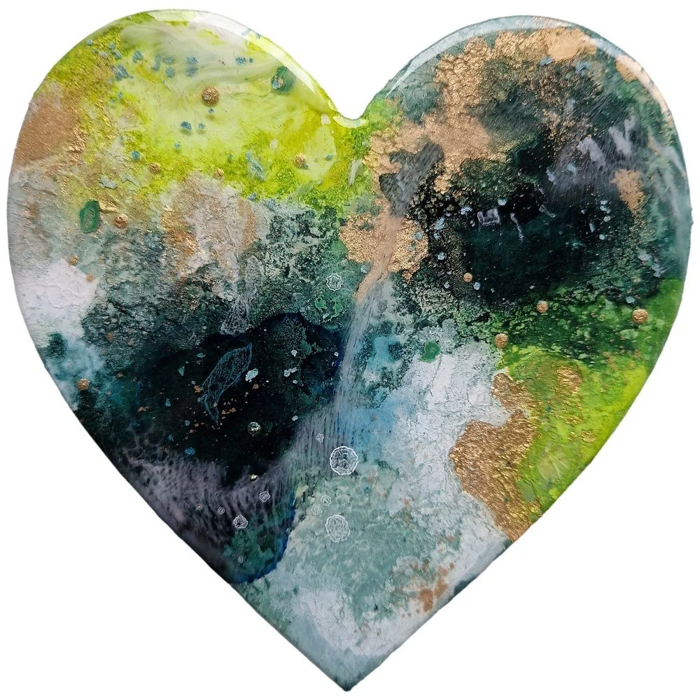 Abstract heart-shaped artwork with green, blue, black, white, and gold textured paint. Abstract resin heart painting with pink, purple, black, and gold. Original bespoke abstract resin ink and mixed media artwork created by artist Katie Alize, based