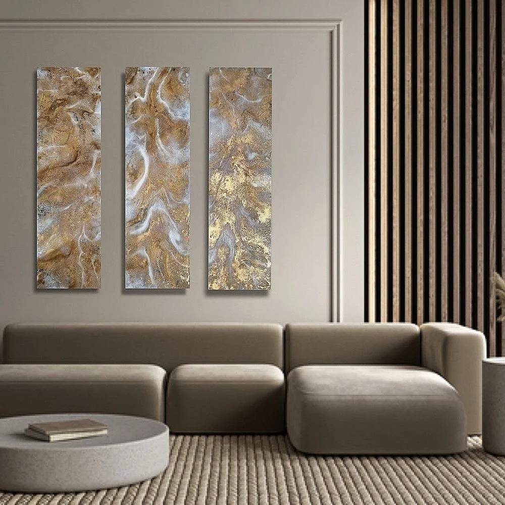 Original bespoke abstract artwork created by artist Katie Alize, based in UK, Essex, London. Abstract wall art with gold, silver, and white patterns, beige wall with molding, and wooden slat wall panel.
