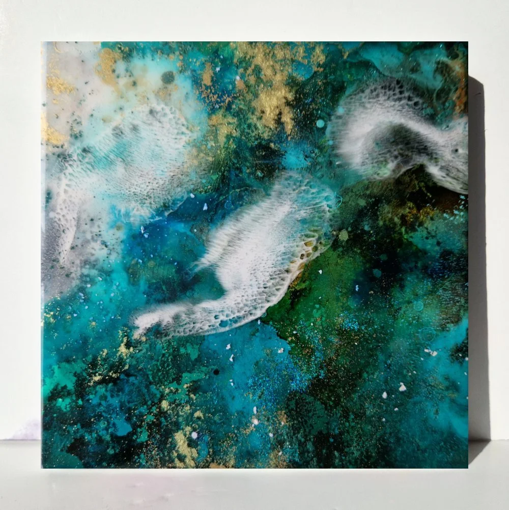 Blue resin abstract art with shades of blue, white, and black, ocean resin art, ocean epoxy art, ocean art, coastal decor, coastal art. Original bespoke abstract artwork created by artist Katie Alize, based in UK, Essex, London.