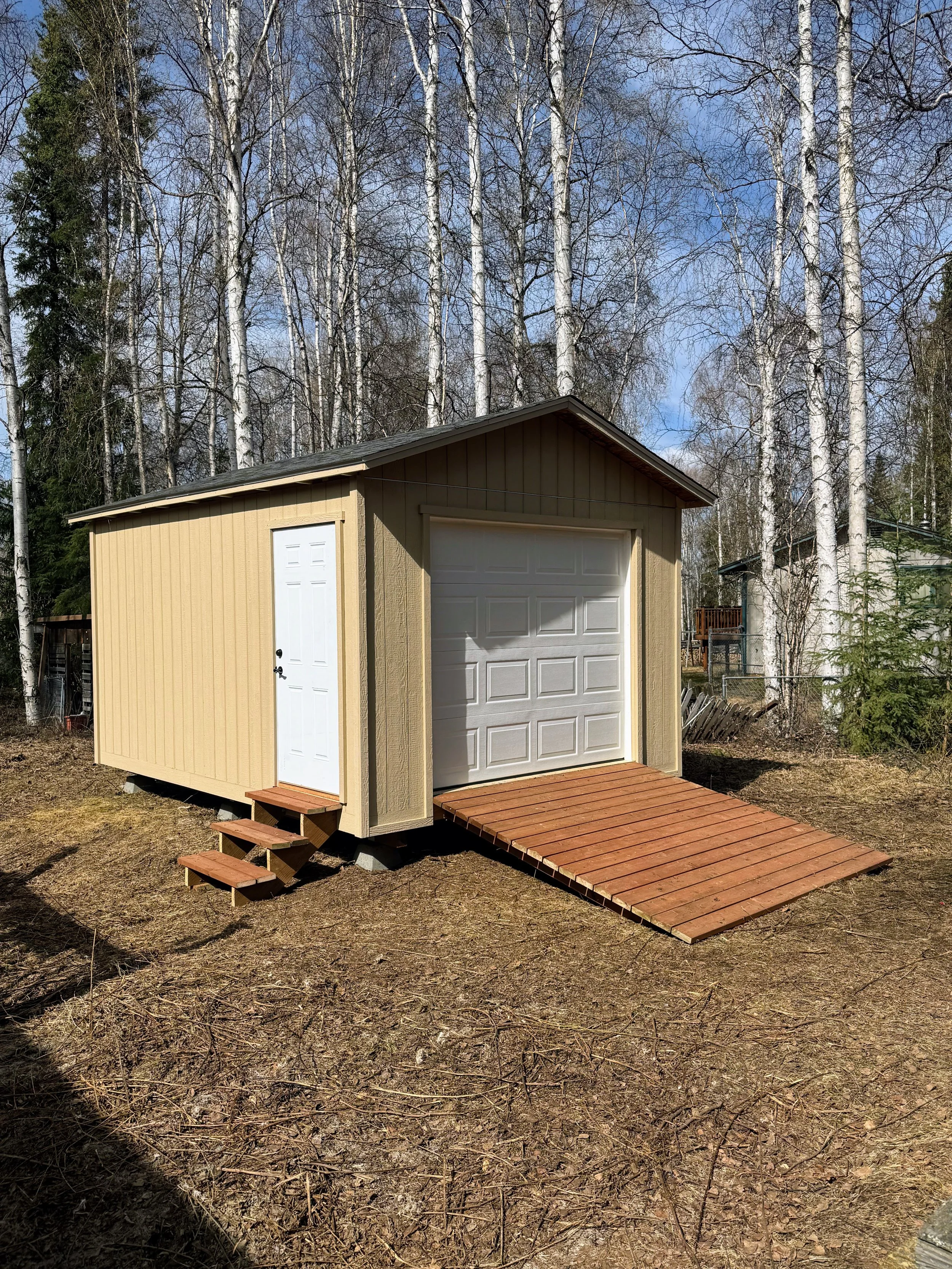 12x20 shed with garage door and man door