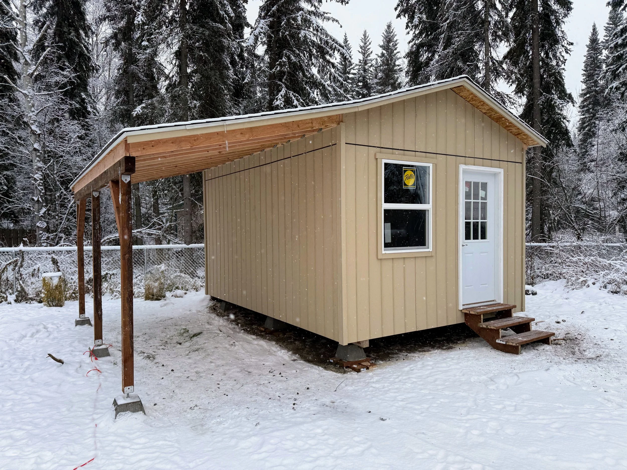 12x16 shed with an 8 ft overhang