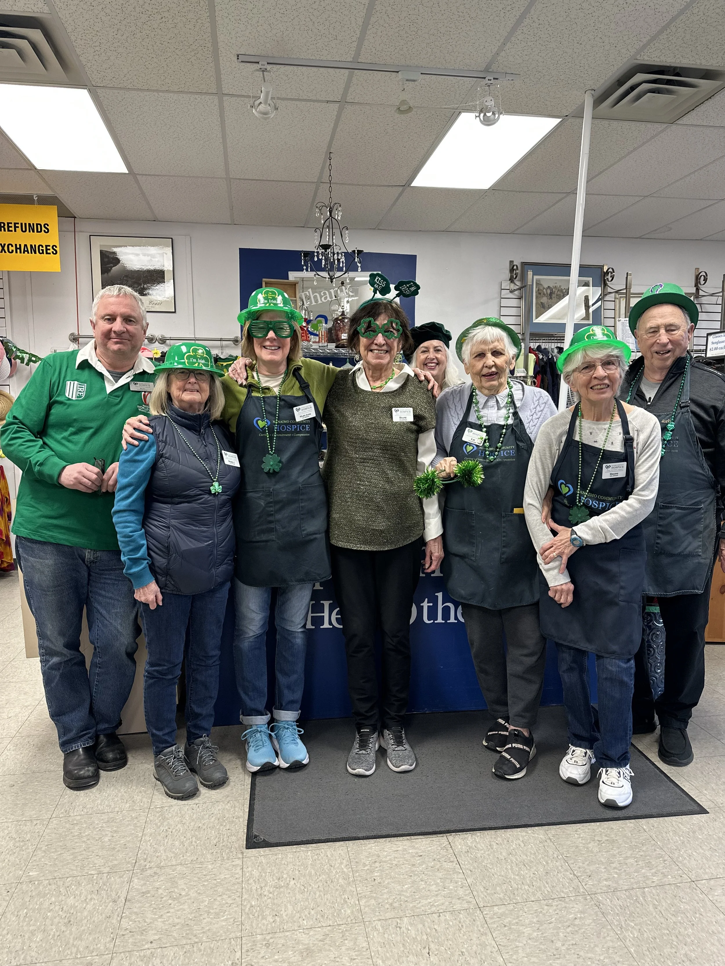 Hospice Shoppe volunteers supporting Nanaimo Community Hospice Society by assisting with thrift store operations and fundraising efforts.