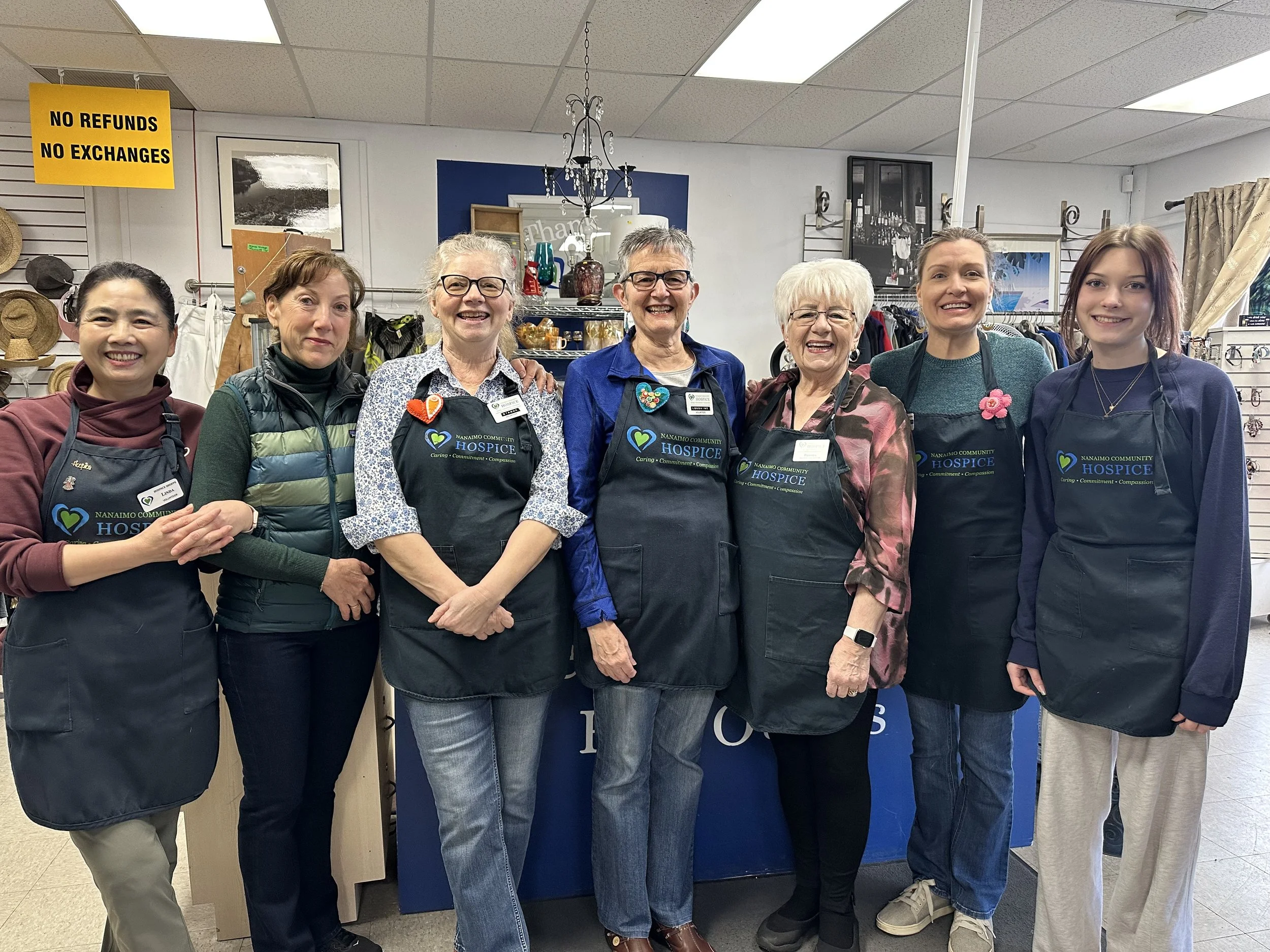 Hospice Shoppe volunteers supporting Nanaimo Community Hospice Society by assisting with thrift store operations and fundraising efforts.