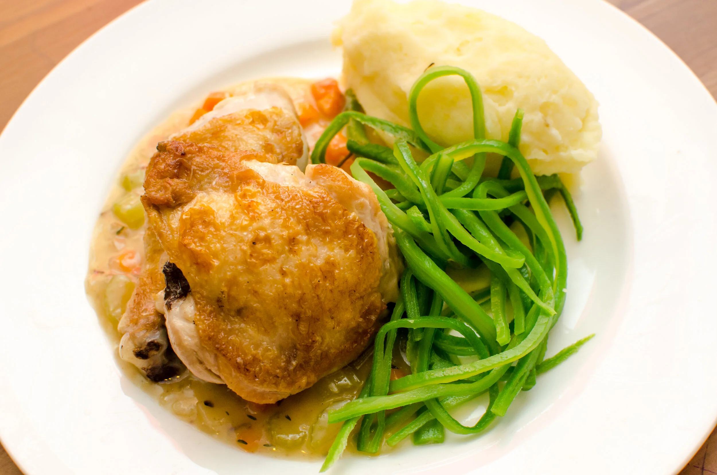 Braised chicken, mashed potato and greens