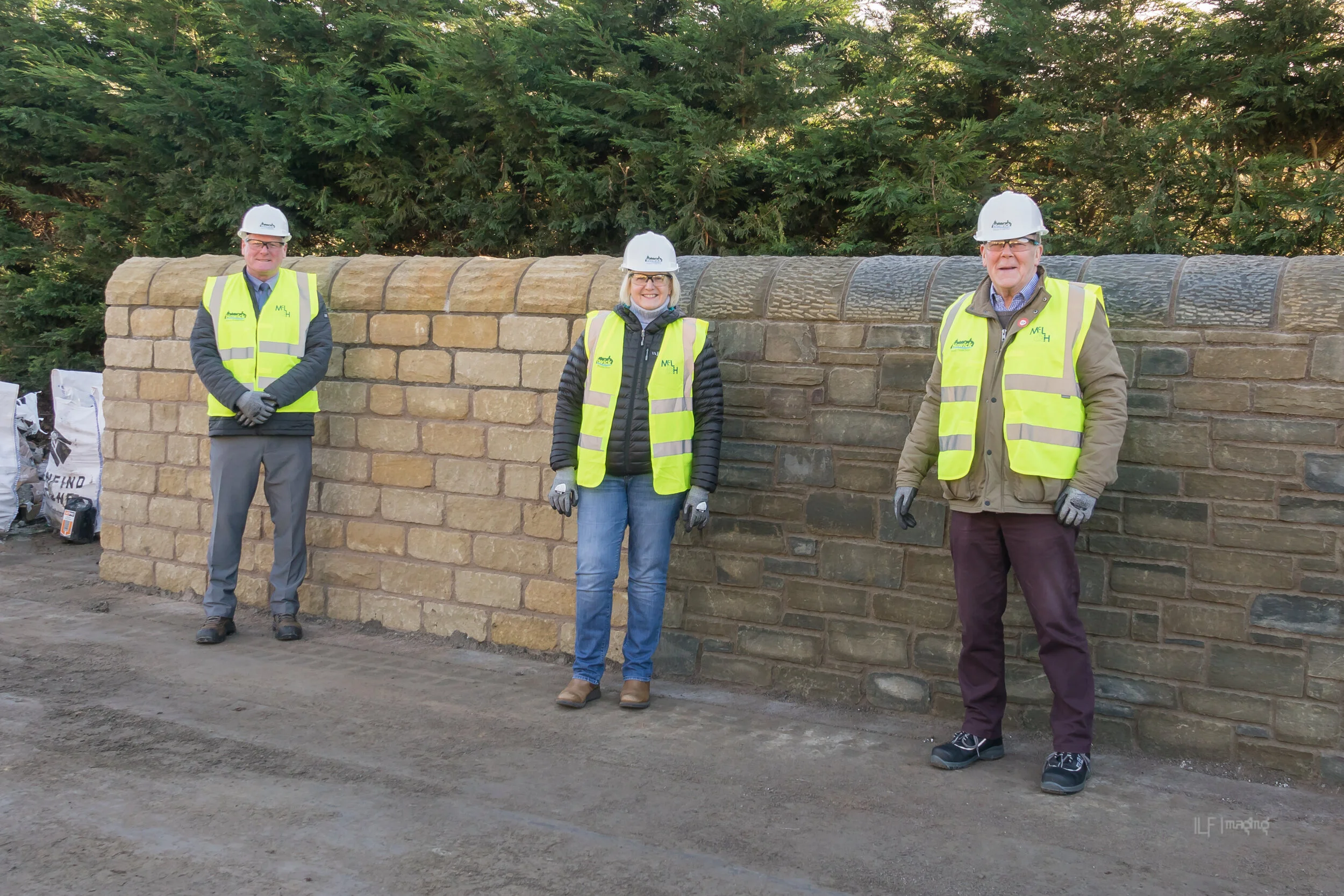 Stone-clad Flood Wall Unveiled