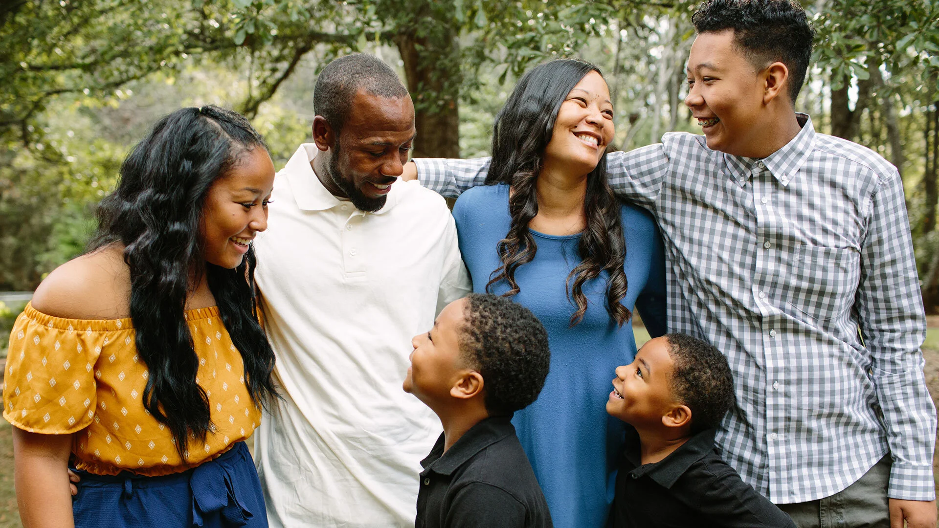 Happy family looking at one-another