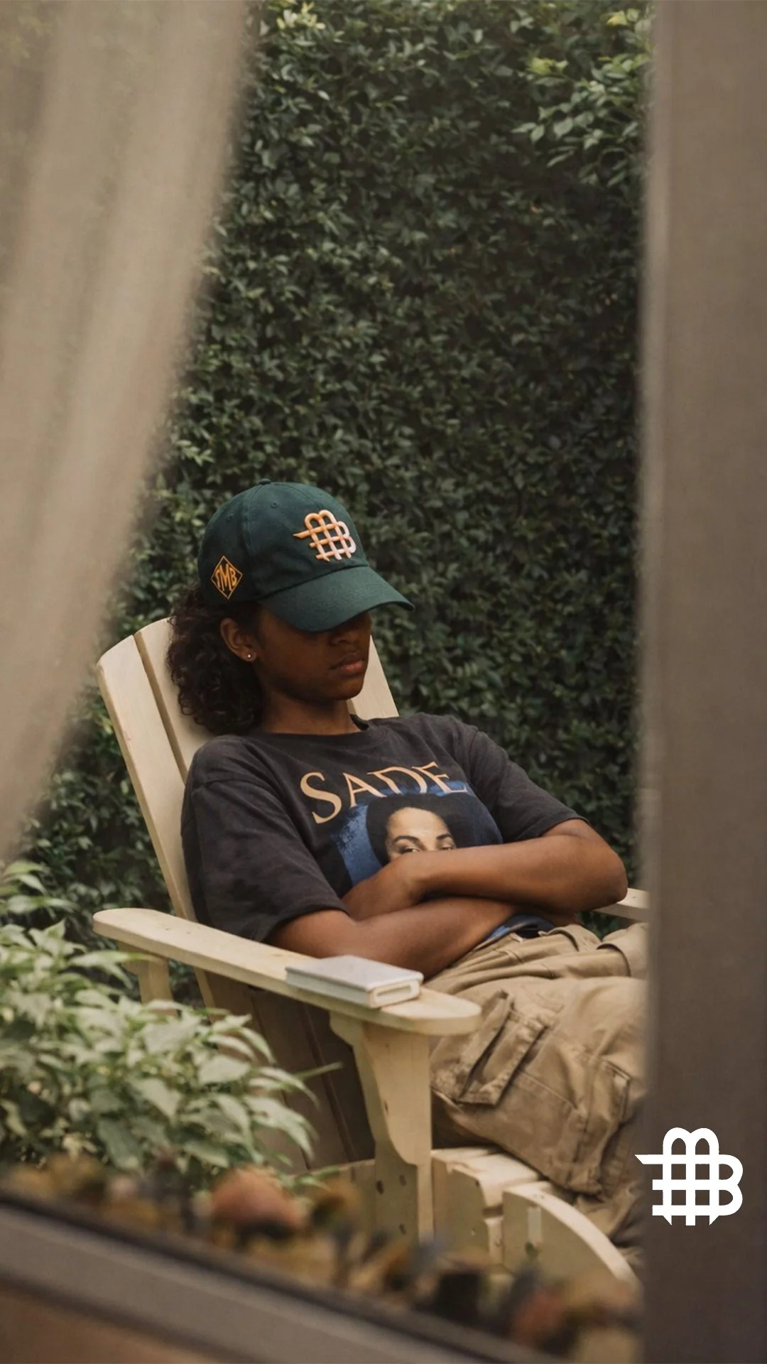 higher logo Black Woman Chilling in The Backyard.jpg