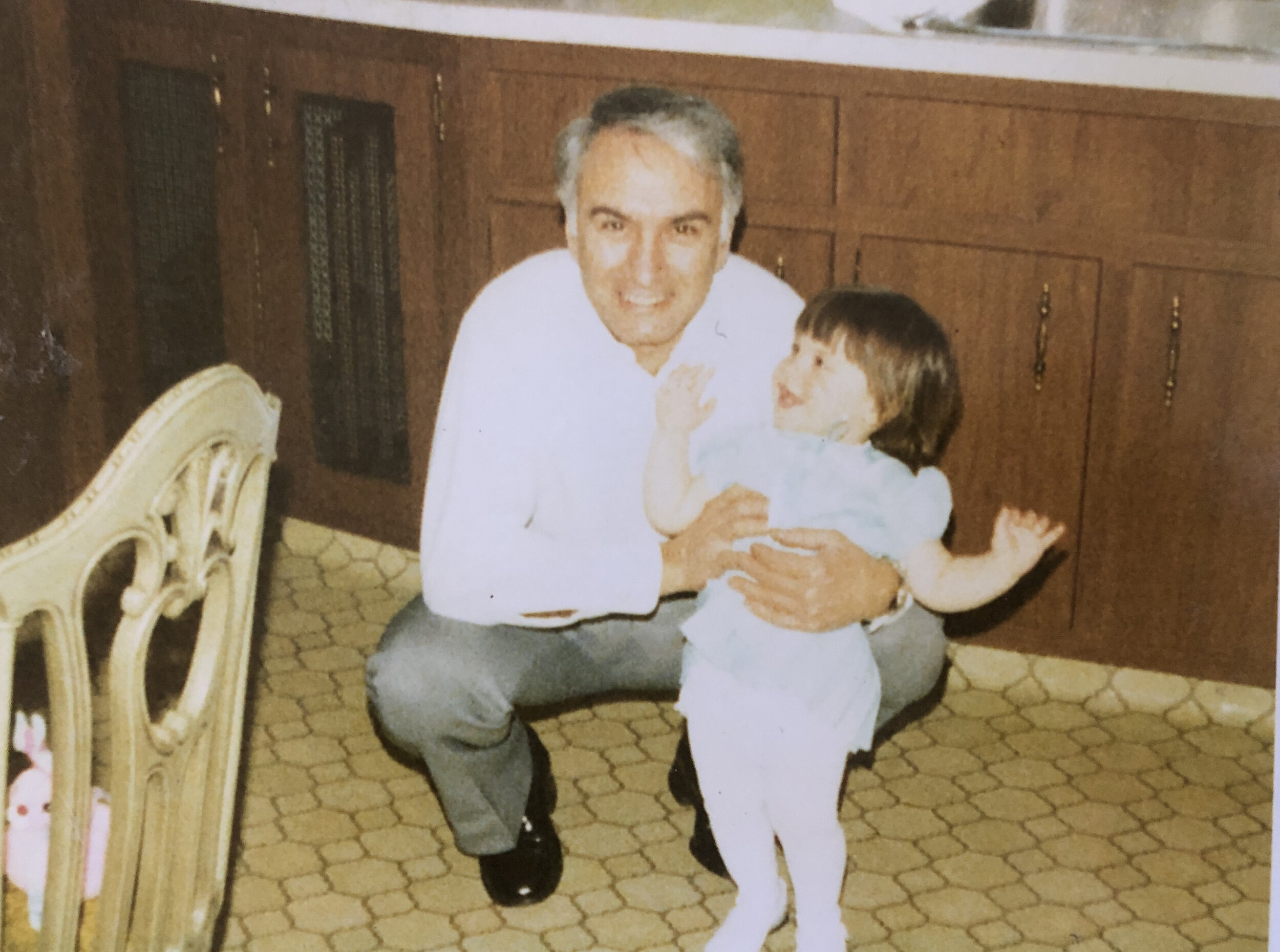 Nicole with her Grandfather as a baby