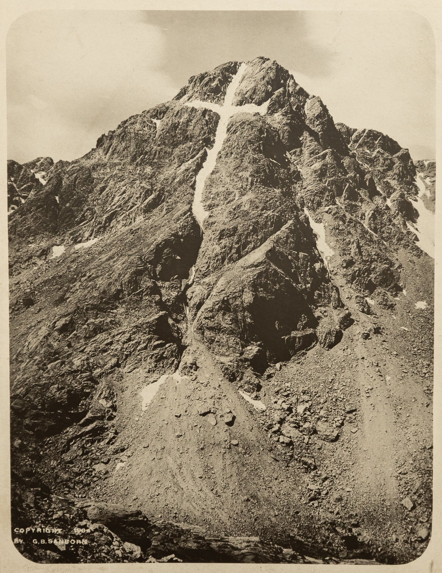 Mt of the Holy Cross, Sawatch Range, 1904. Photograph by G.B. Sanborn. Molly Brown Archives. Historic image of an iconic Colorado peak, standing at 14,009’ (4,276m). First ascent of the mountain was in 1873.