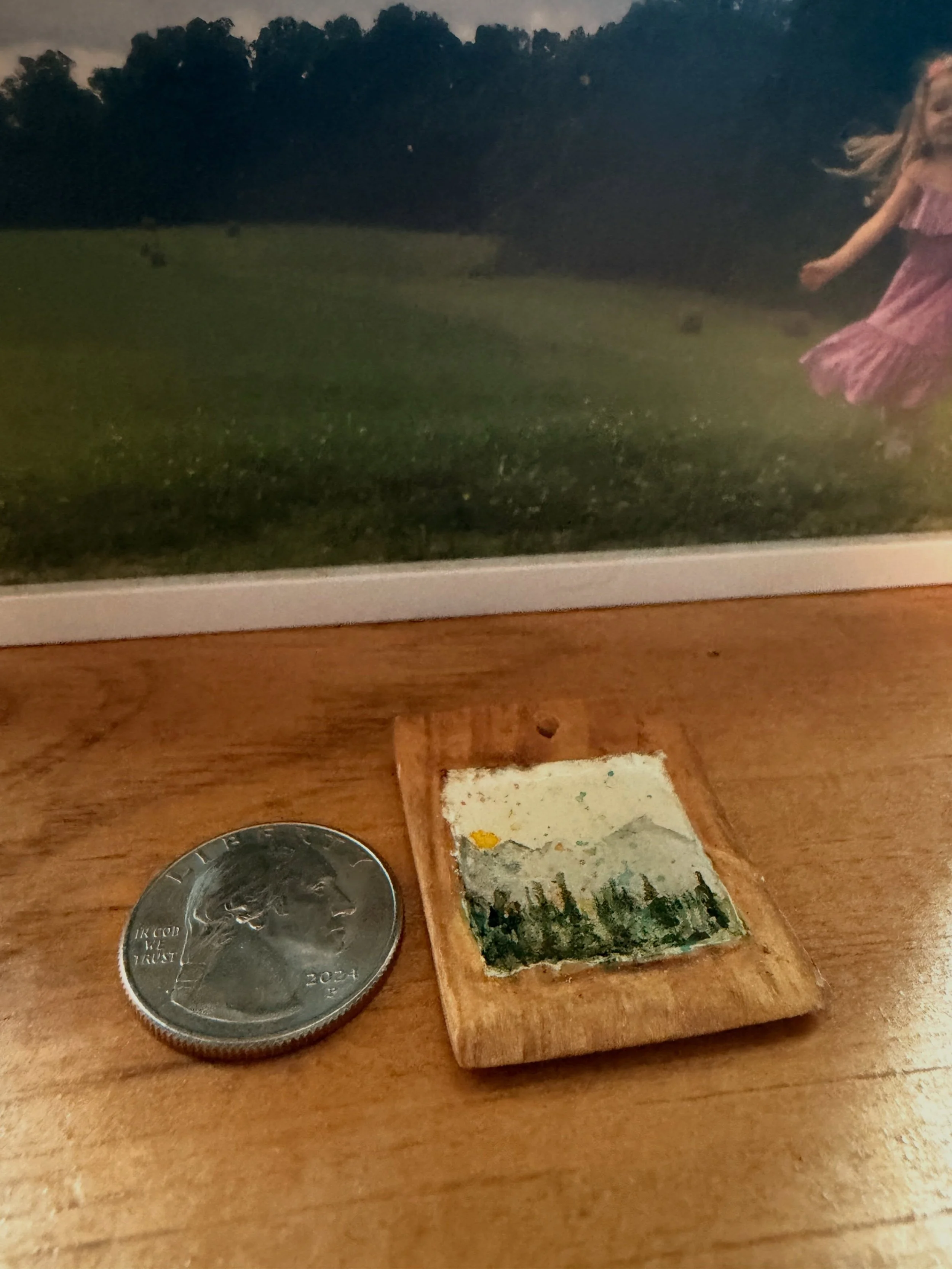 ✑ request to create some tiny art again. art that can become a pendant or a fridge magnet or a tiny landscape on a windowsill. 

⌂ p.s. background pic of the little figure in the field is my gal a few years ago. she&rsquo;s off dancing and praising o