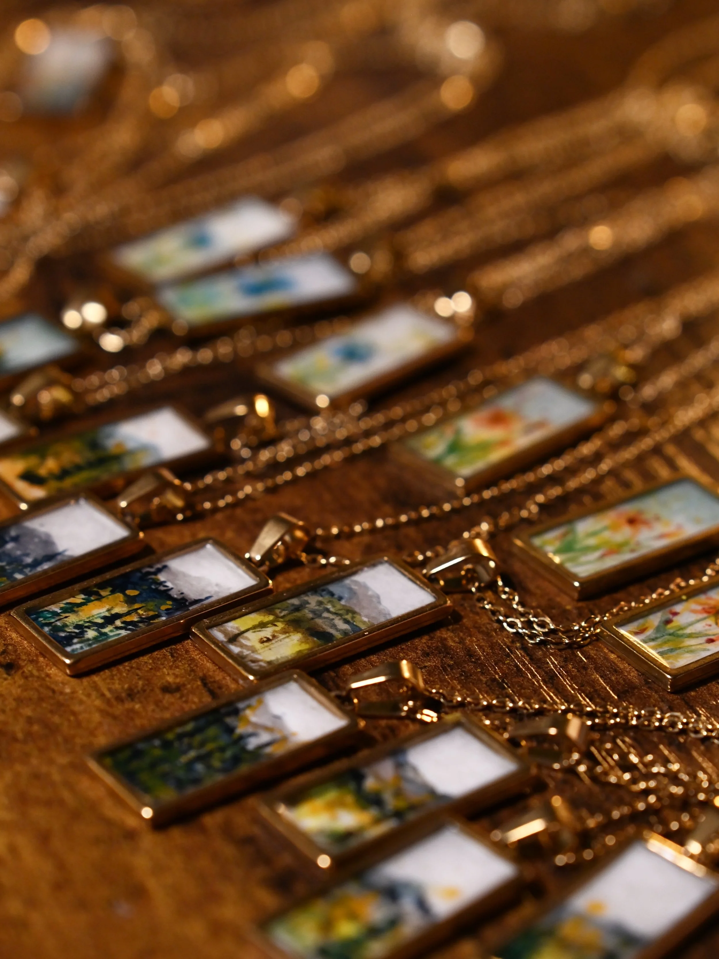 ✑ 
original watercolor artwork, hand-painted by emily
painted on 144 lb watercolor paper
inlaid and finished with resin
gold stainless steel charm and pendant
17 in stainless steel gold chain
rectangle pendant size: 31 &times; 13 mm
marietta, ohio &g