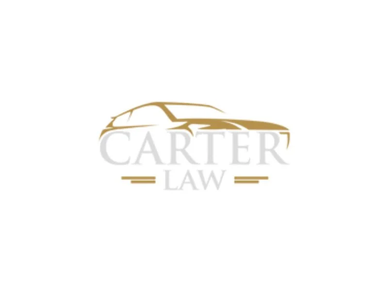 Logo for Carter Law with a gold outline of a car above the text.