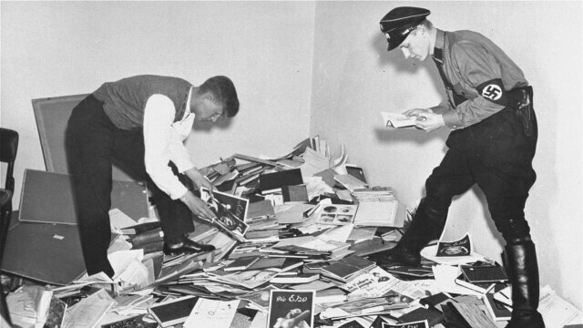 German students and Nazi SA plunder the library of Dr. Magnus Hirschfeld, Director of the Institute for Sexual Research in Berlin.