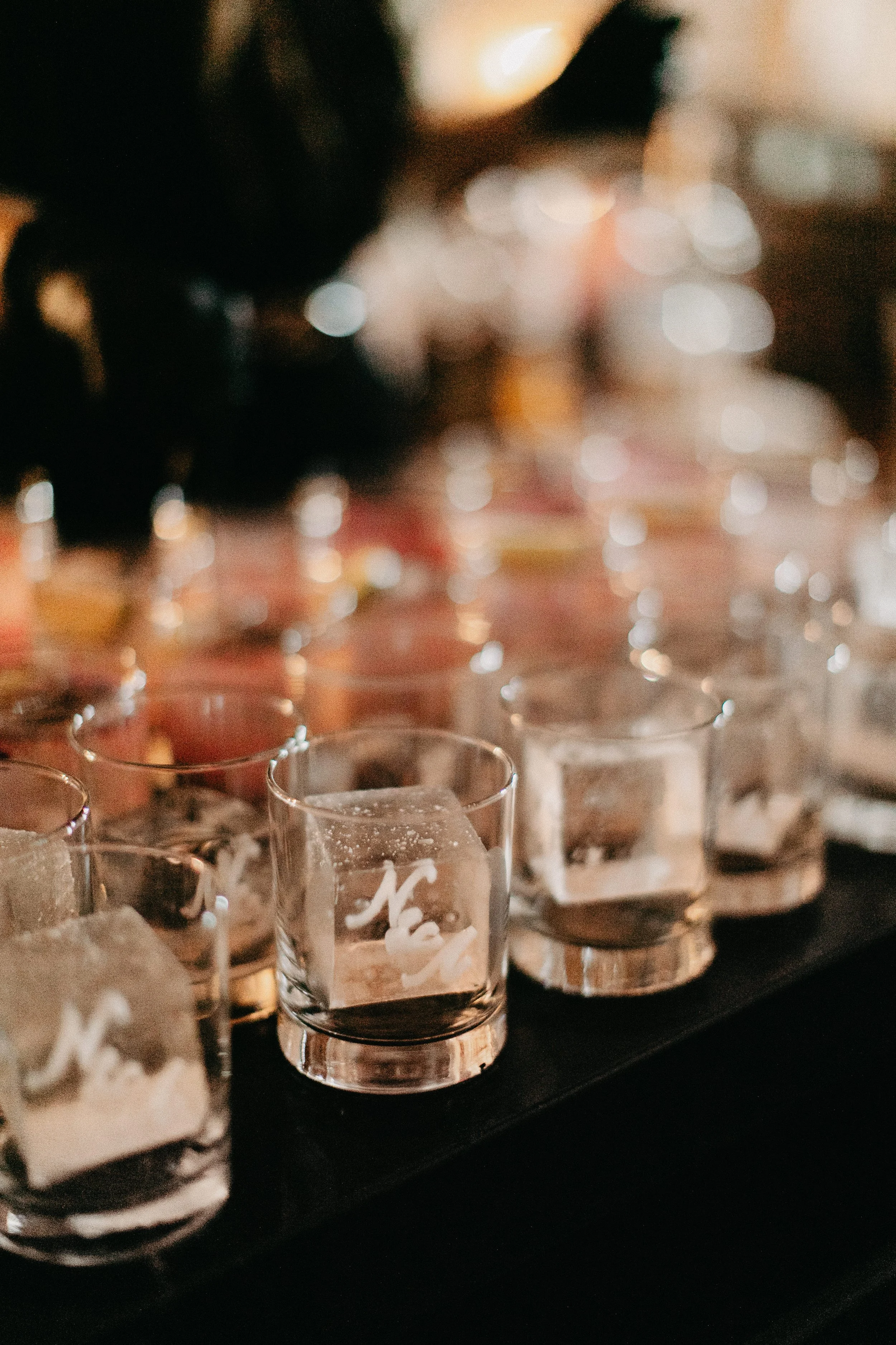 monogrammed ice cubes for signature cocktails winter wedding at maysara winery