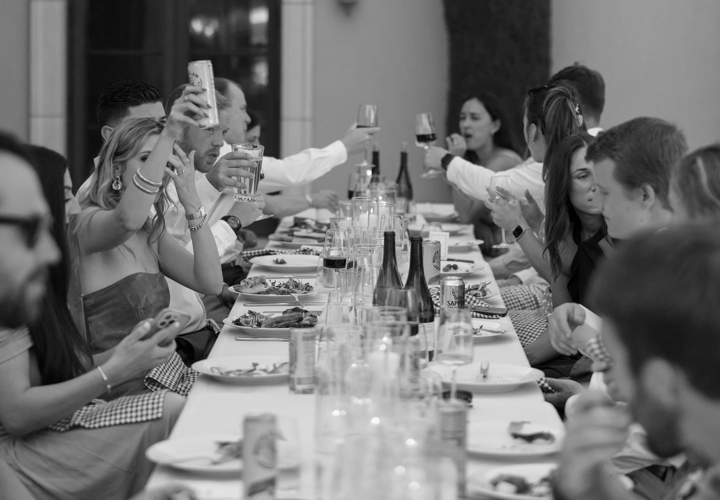 Black and White photo of guests dining at table