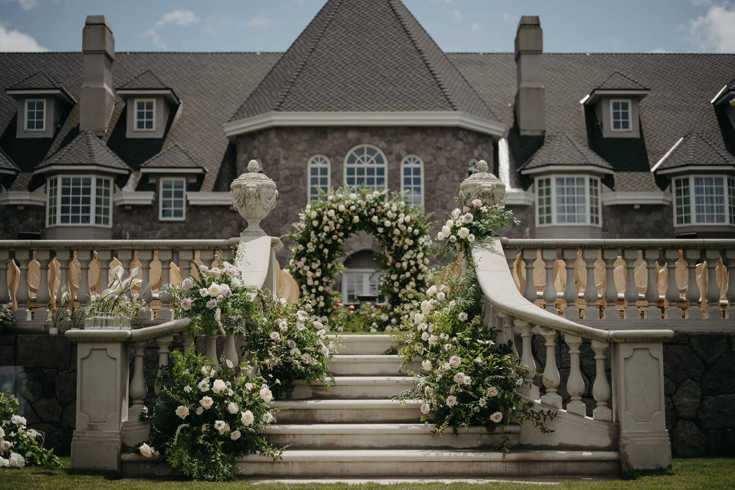 grand wedding floral installation staircase